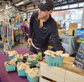 Your local Mushroom Cultivator, Jordan Clark, at Independence Uptown Farmers Market.