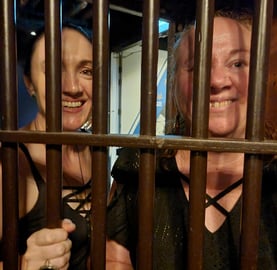 Carly and Jodi behind the bars in the strong room vault for Penny's 40th.