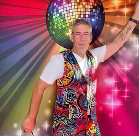 DJ Vella striking a disco pose in the digital photo booth hired for MS Foundation Fundraiser Capalaba.