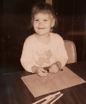 Cindy as a little girl drawing