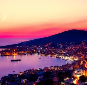 a cityscape of a city at night