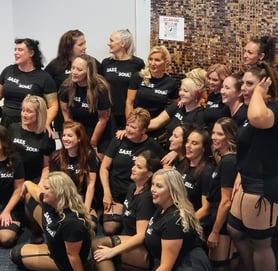 The Sass and Soul team in front of the SweetAz Co. rose gold shimmer wall hire at HOTA, Gold Coast