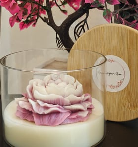 A white and pink scented peony candle in transparent jar which is the best gift for any occasion. 