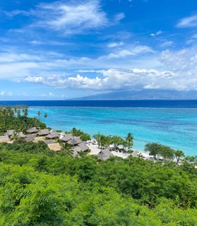 Luxury resort overlooking the stunning blue lagoon of Moorea, French Polynesia.