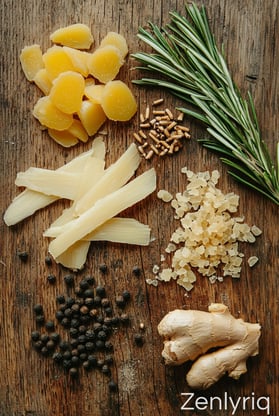 fresh ginger and turmeric on a wooden board, known ingredients for natural joint relief