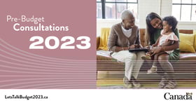 a woman and her daughter are sitting on a couch