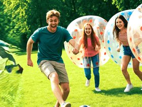 a group of people playing soccer in a fieldMPERBALL IN GREENVILLE
