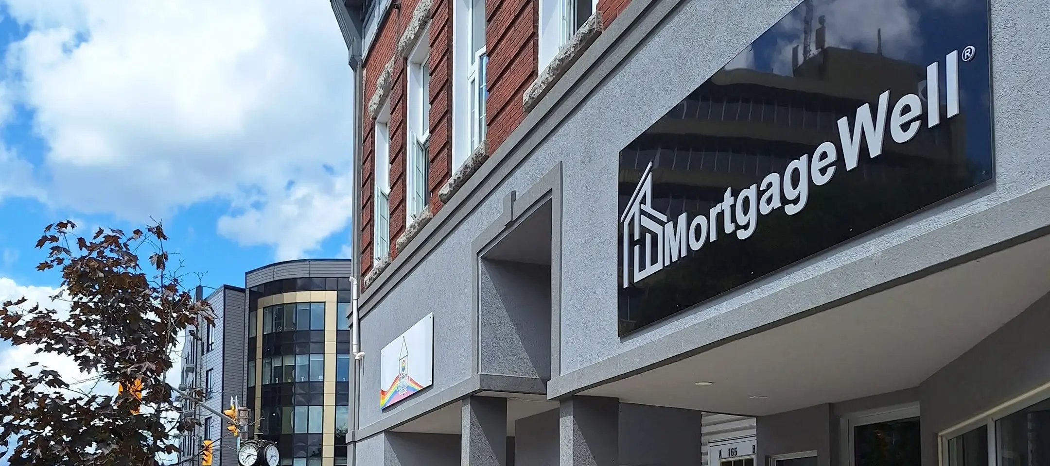 Mortgage broker sign for MortgageWell office in downtown Cornwall Ontario