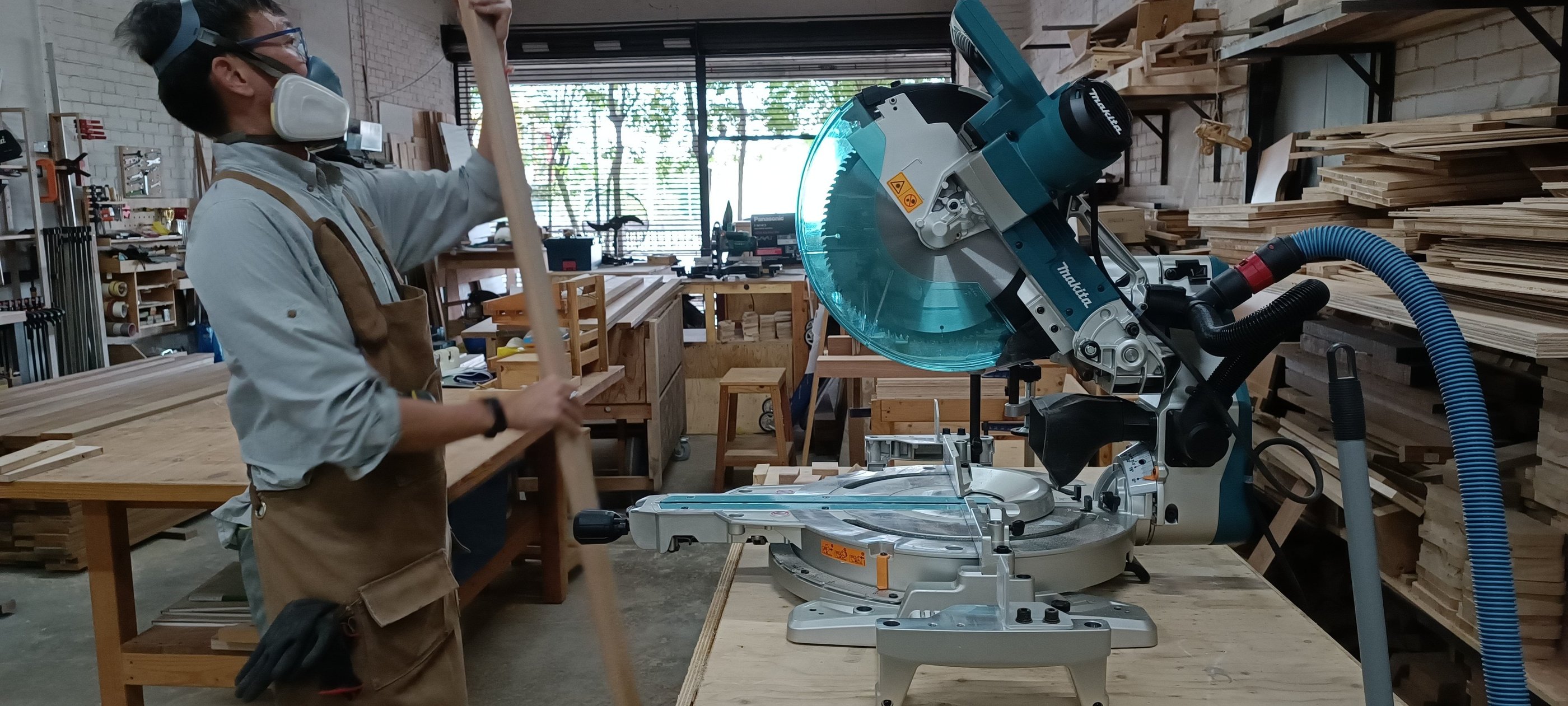 Method of using a mitre saw