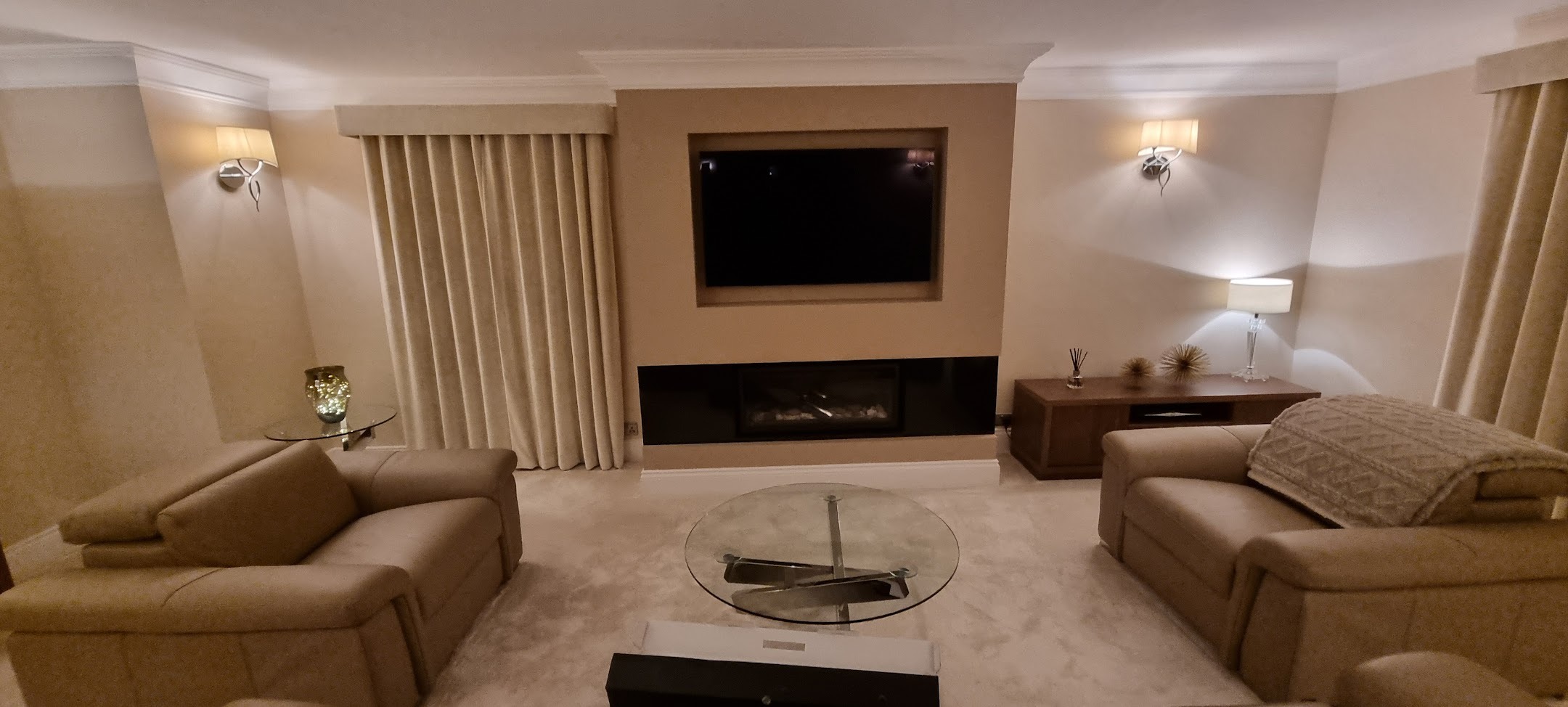 Bespoke media wall with 4K TV and electric fire in Milton Keynes.