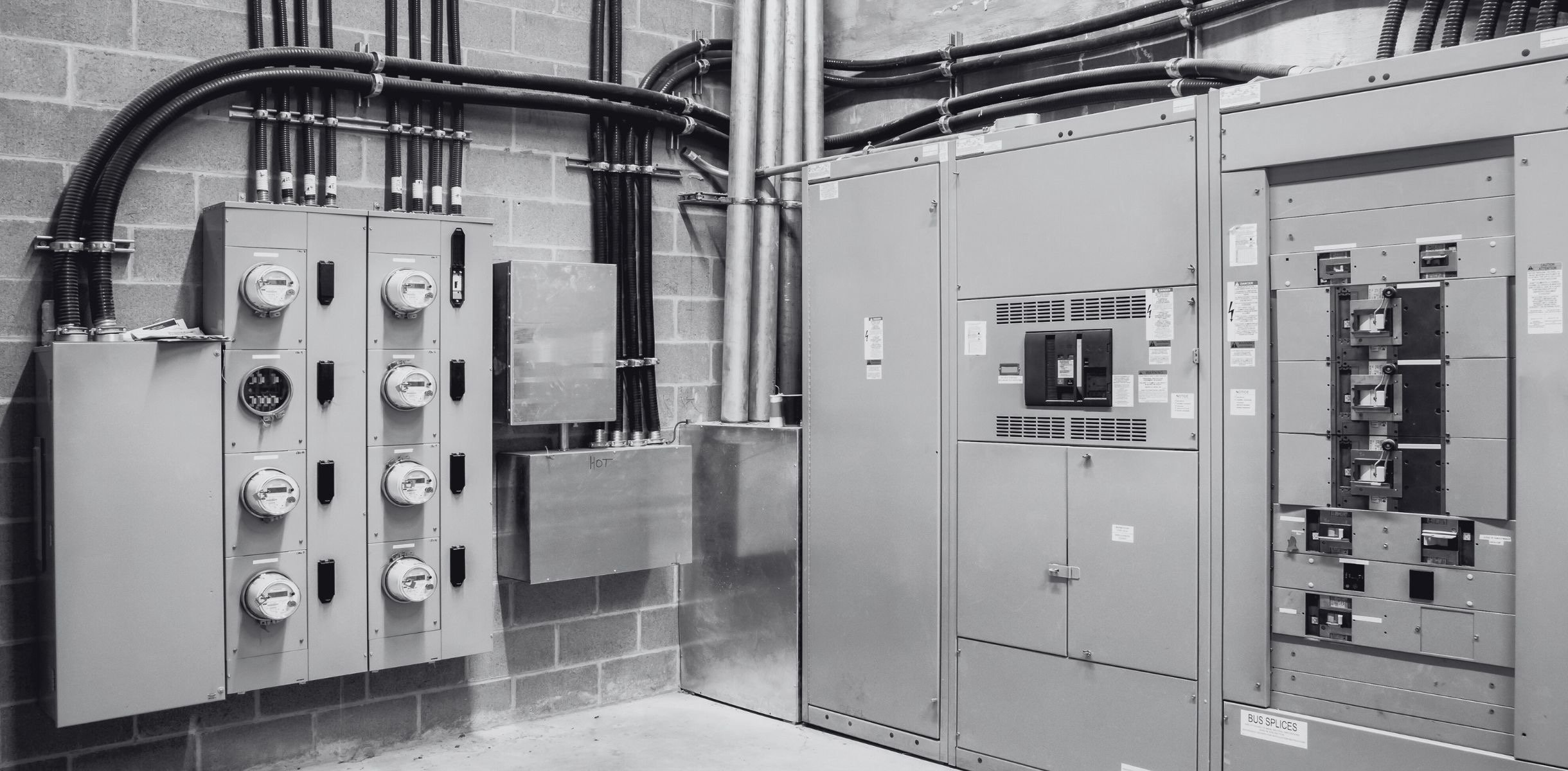 D.A. Electric commercial electrician working on panel Kansas City