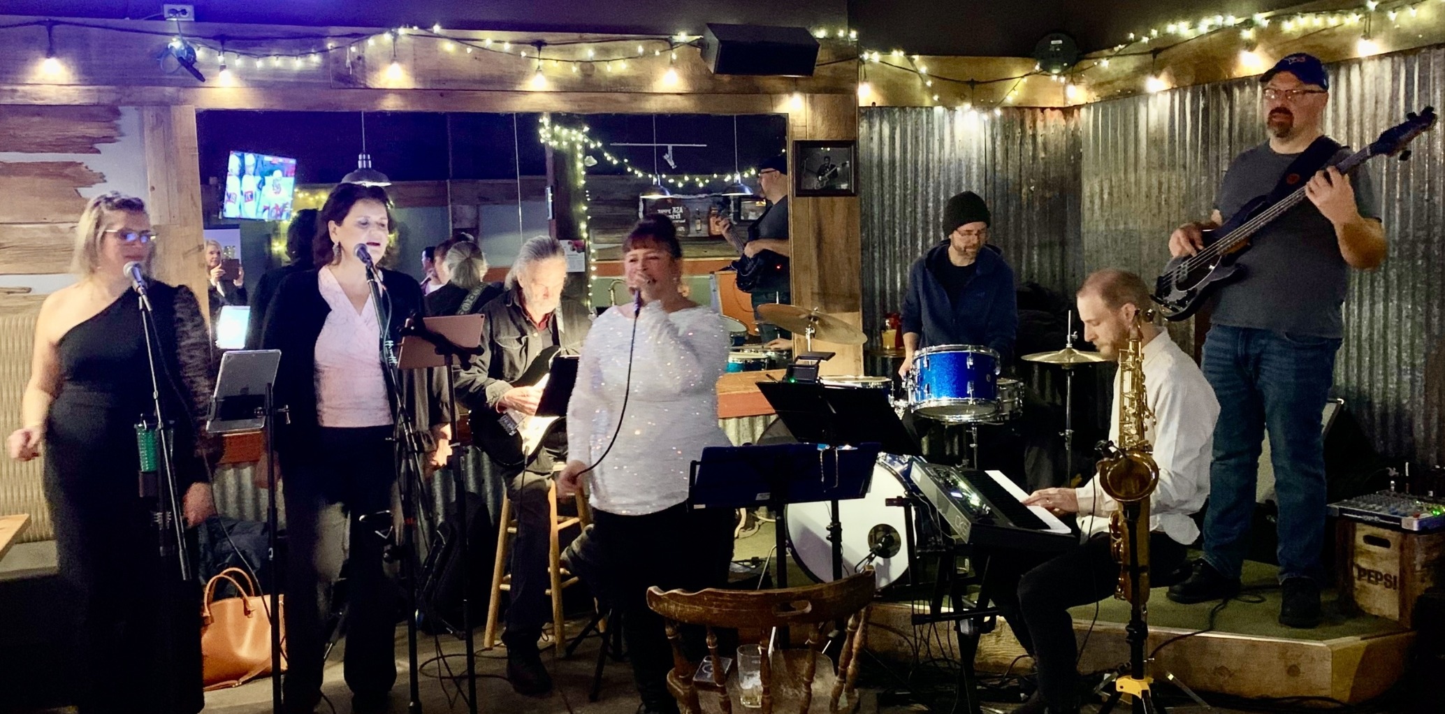 Birds of a feather band performing on stage
