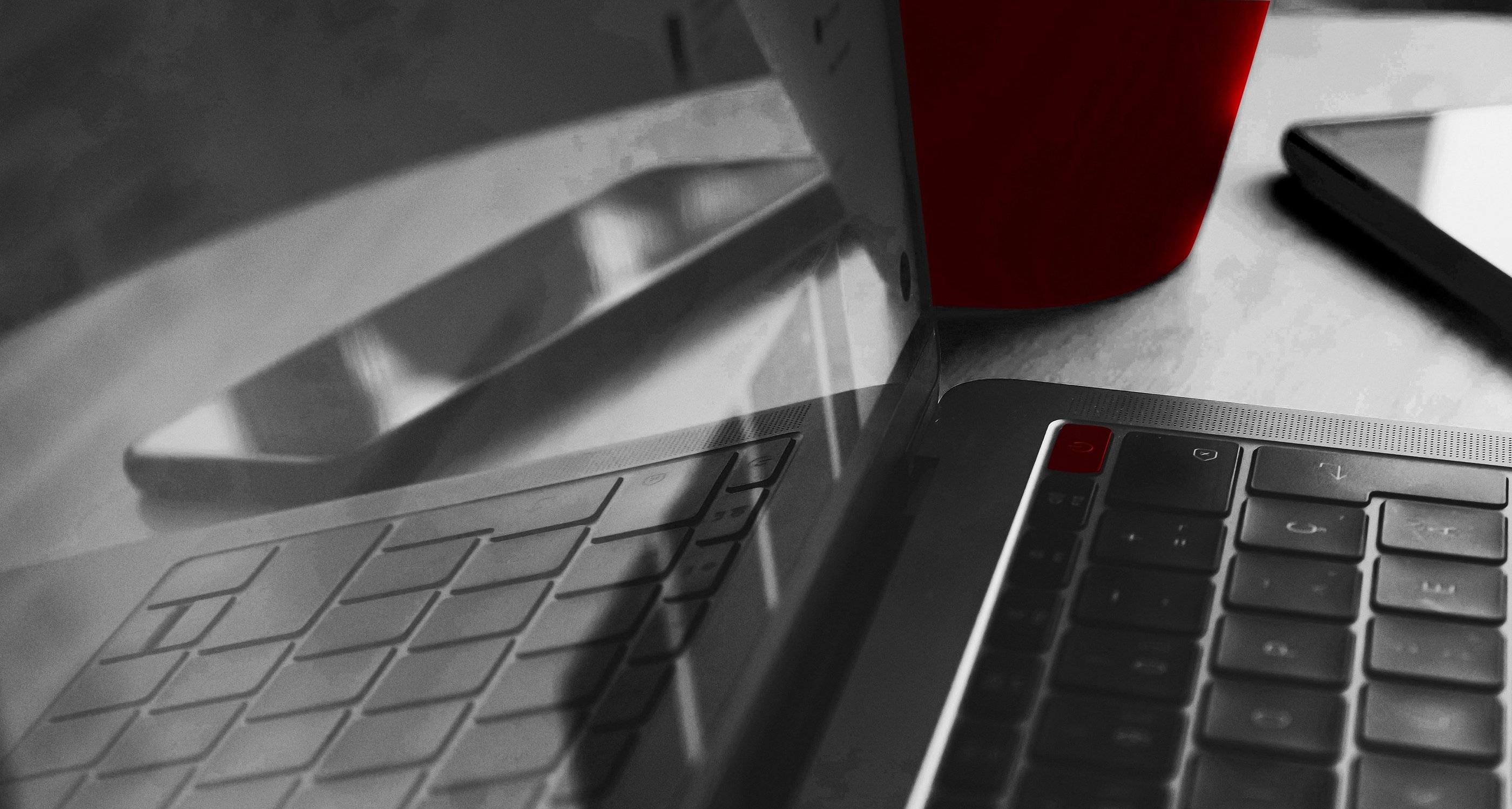 Laptop keyboard with red power button