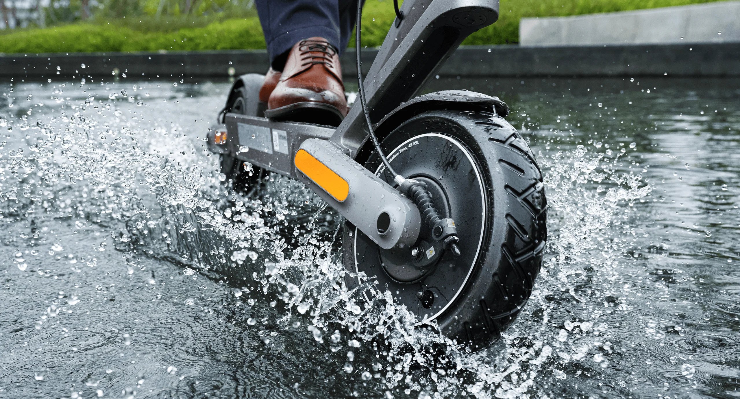 a person riding a scooter in the water