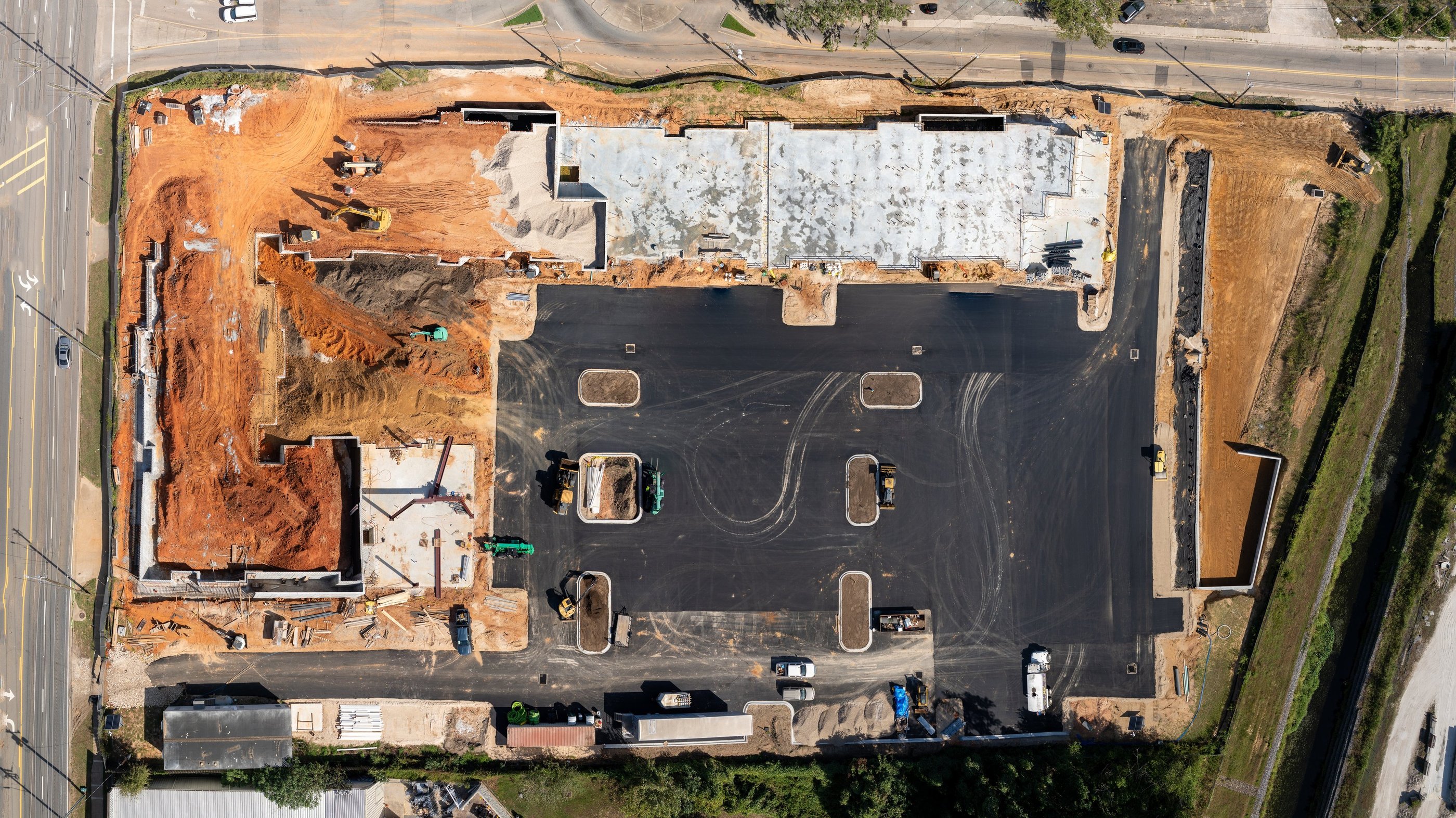 a building under construction with a lot of construction materials