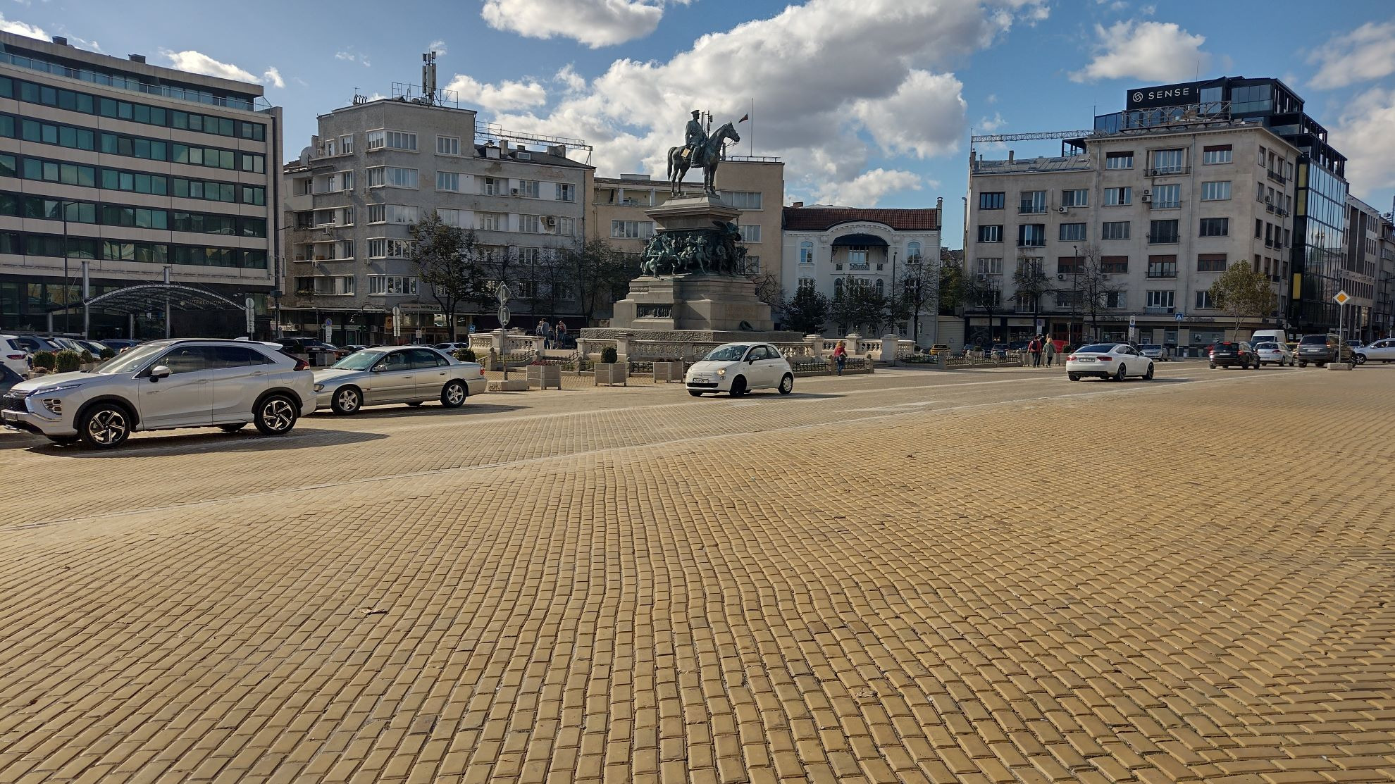 alt="Street in Sofia featuring the statue of the Tsar Liberator"