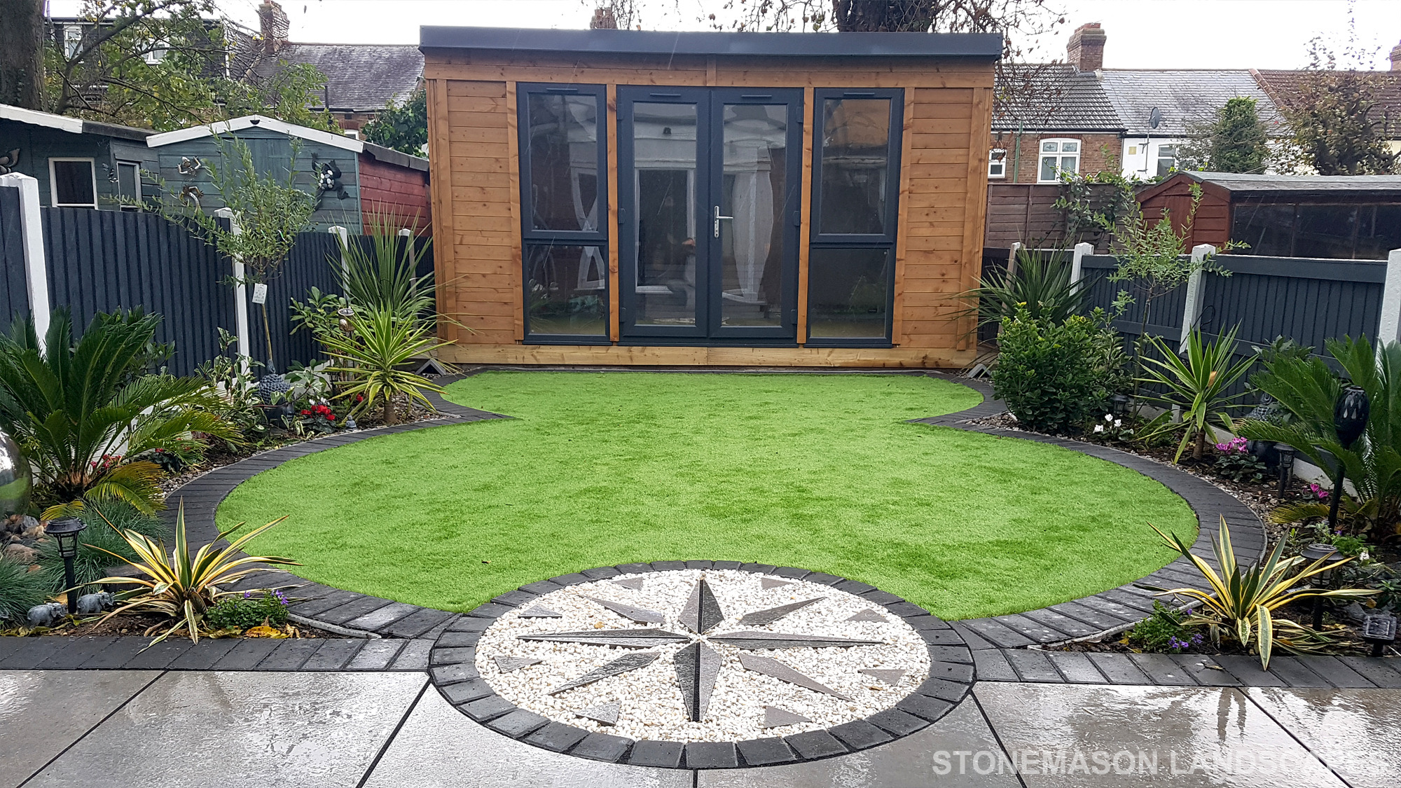 Exotic Modern Dynamic Designer Circle Lawn Tropical Small Garden