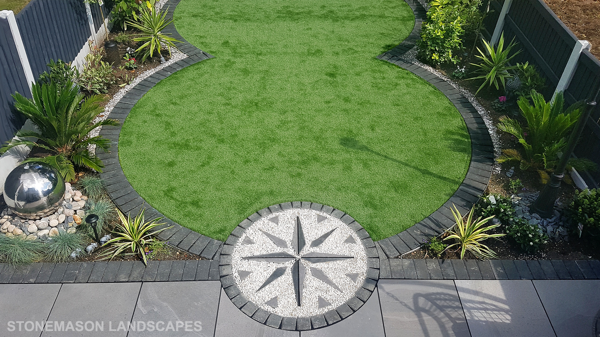 Exotic Modern Dynamic Designer Circle Lawn Tropical Small Garden