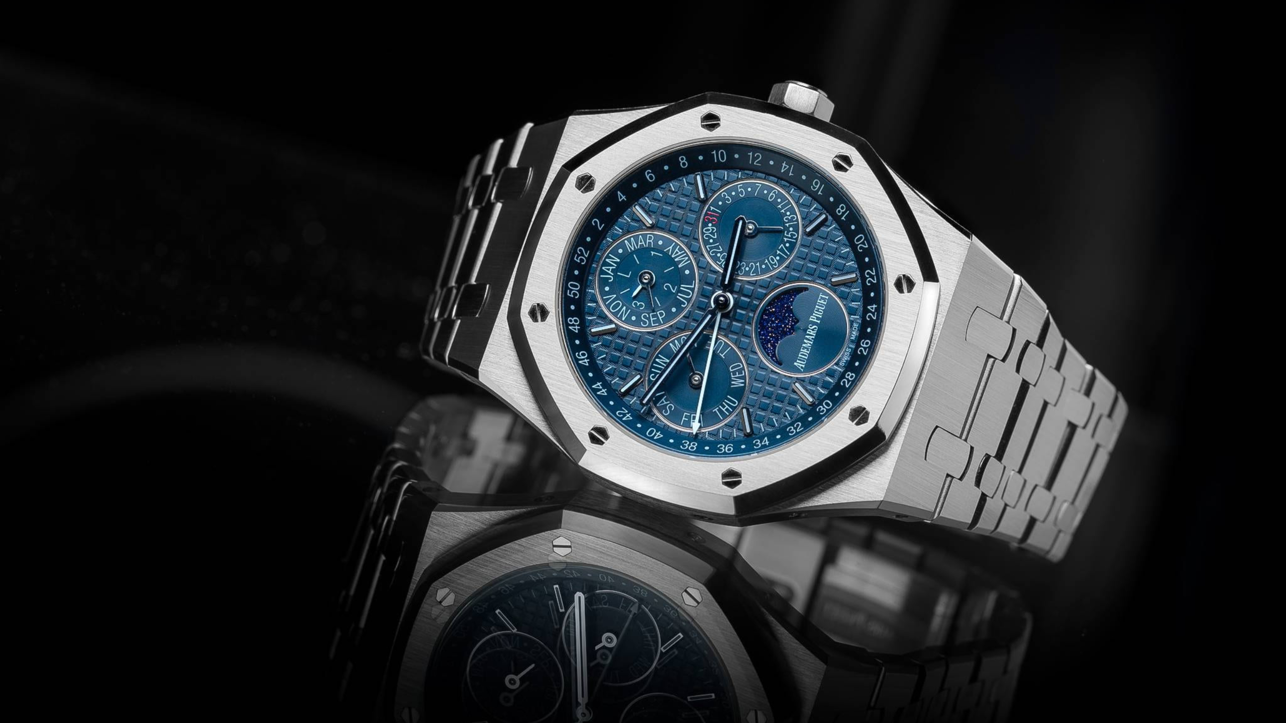 Audemars Piguet Royal Oak Moonphase watch with blue dial and stainless steel case