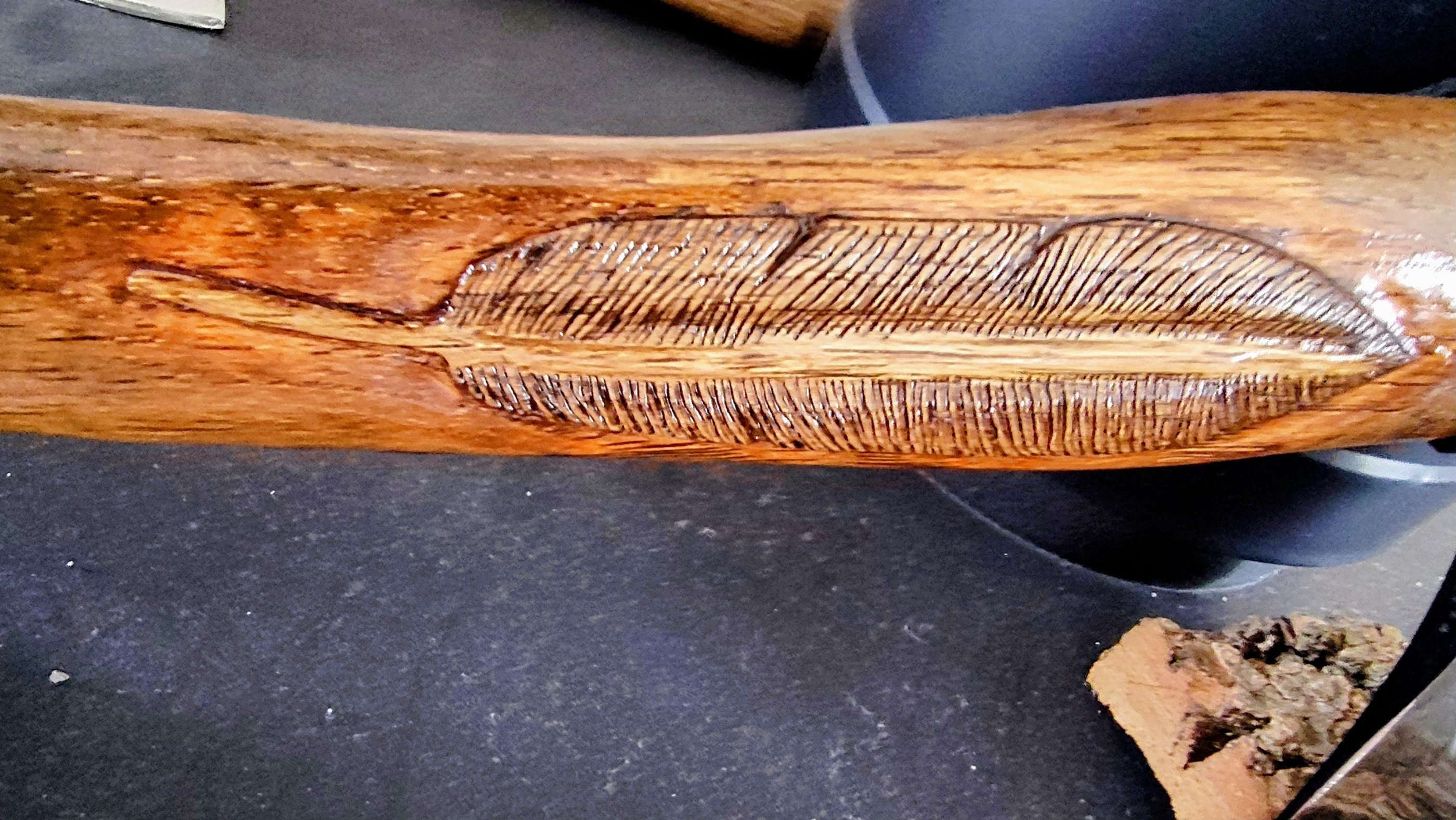 relief carved feather