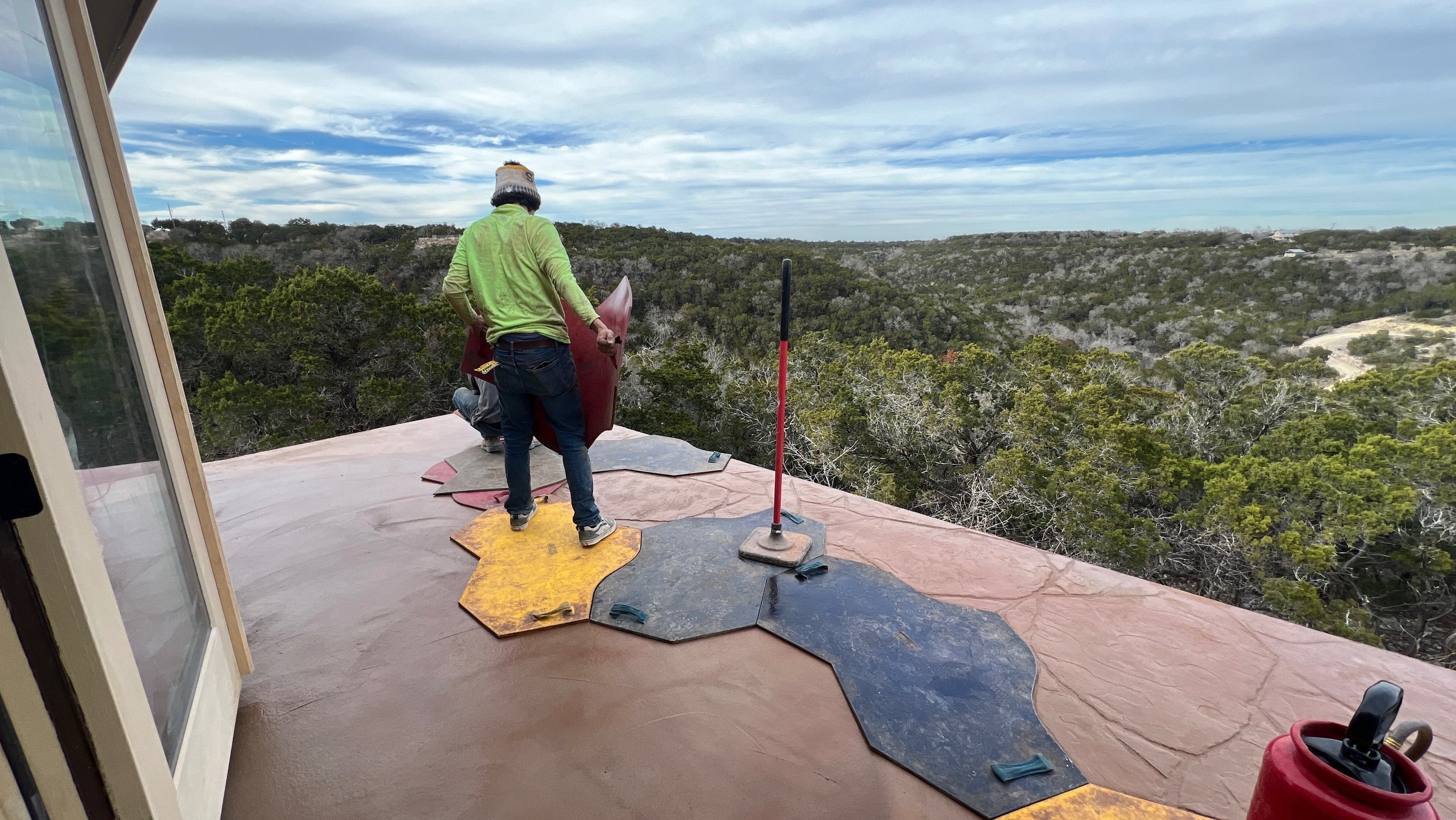 Stamping a concrete balcony.