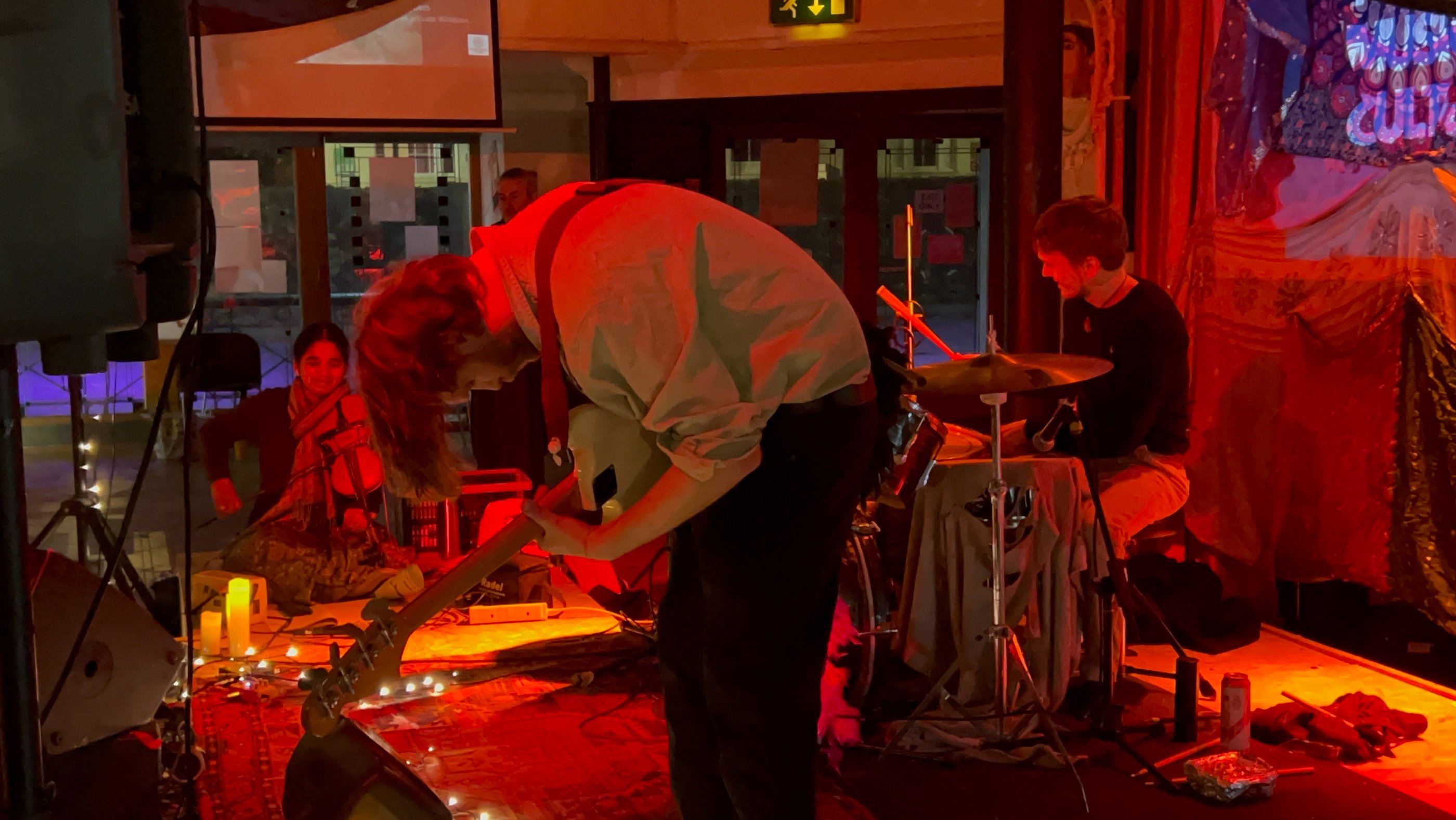A picture of artists playing their instruments