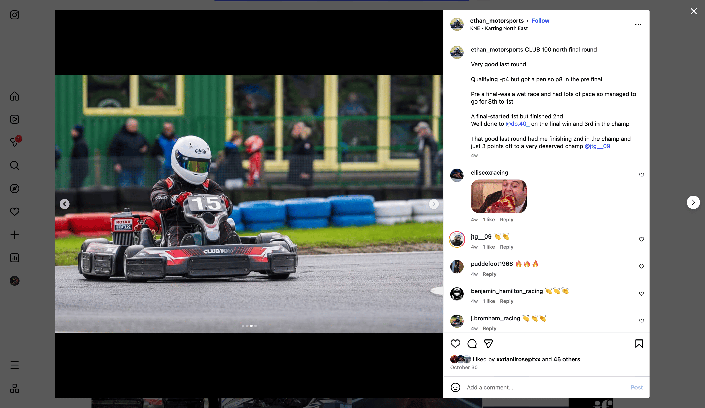 a person in a helmet and helmet on a race track