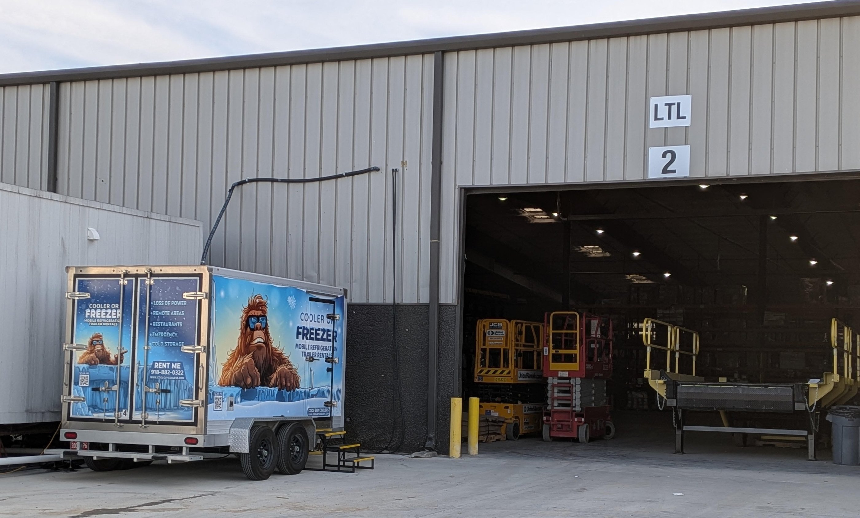 Emergency refrigeration trailer rental at a warehouse loading dock