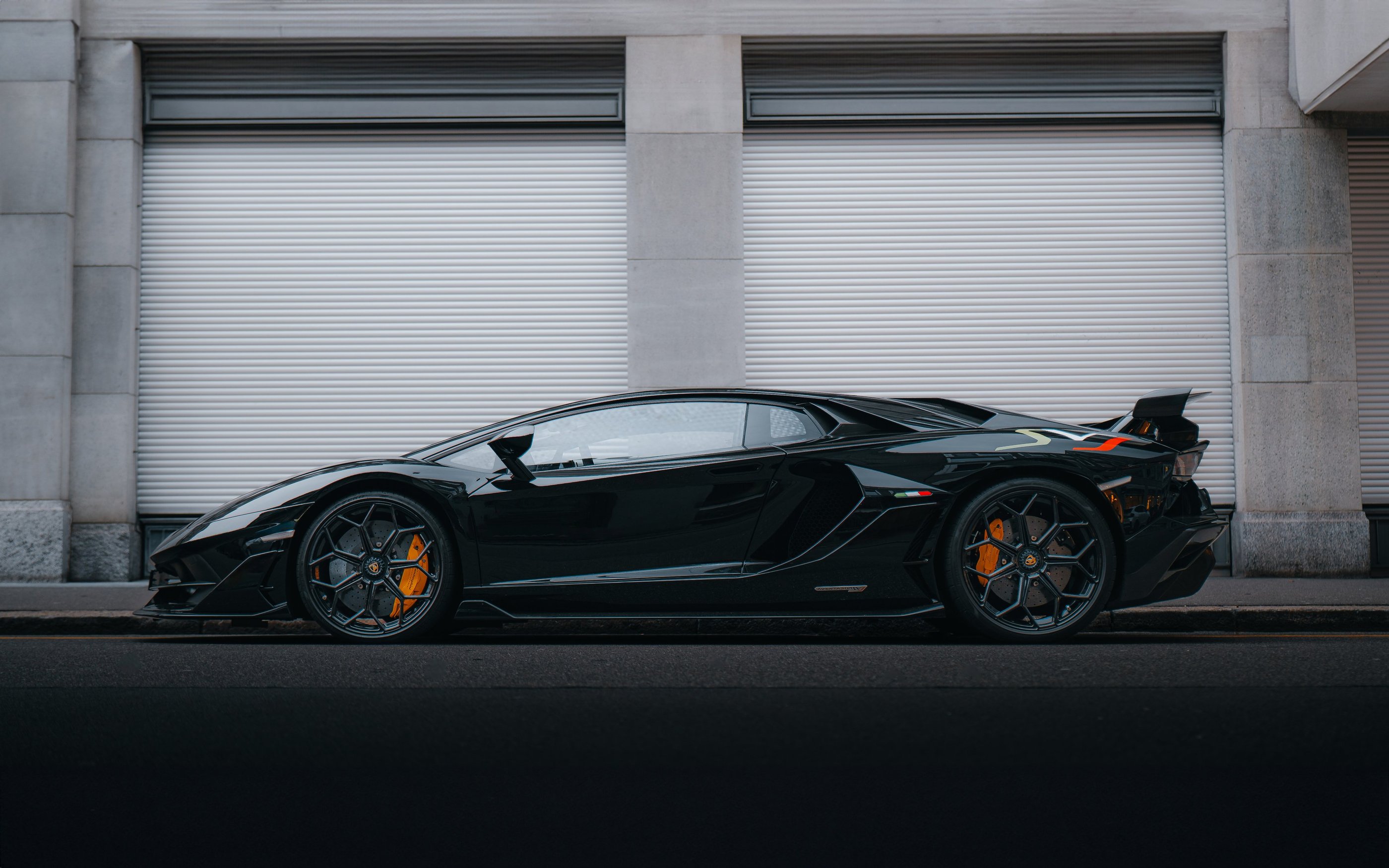 a black lamborghini aventador svj
