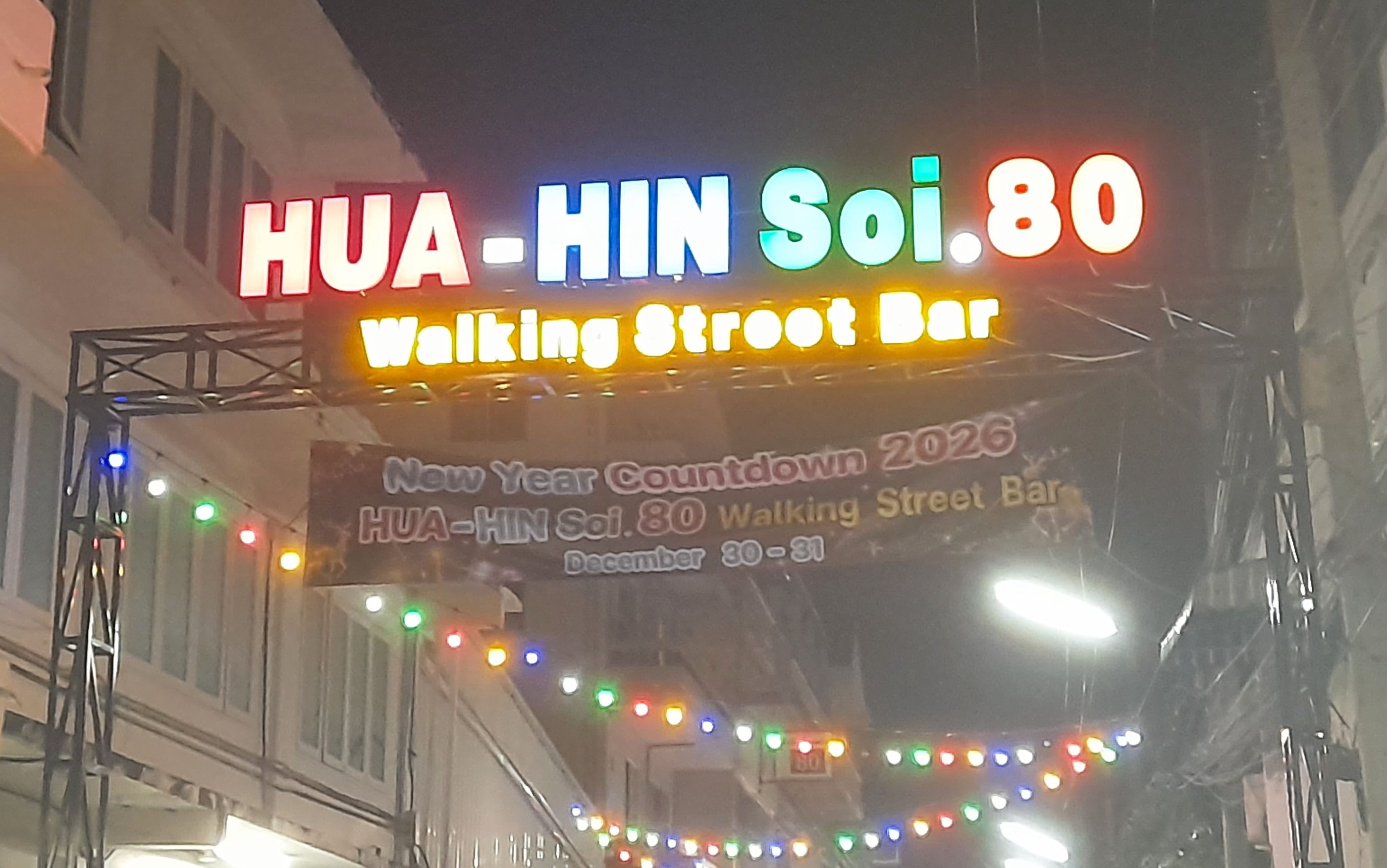 Entrance sign with neon lights for Soi 80, Hua Hin in Thailand