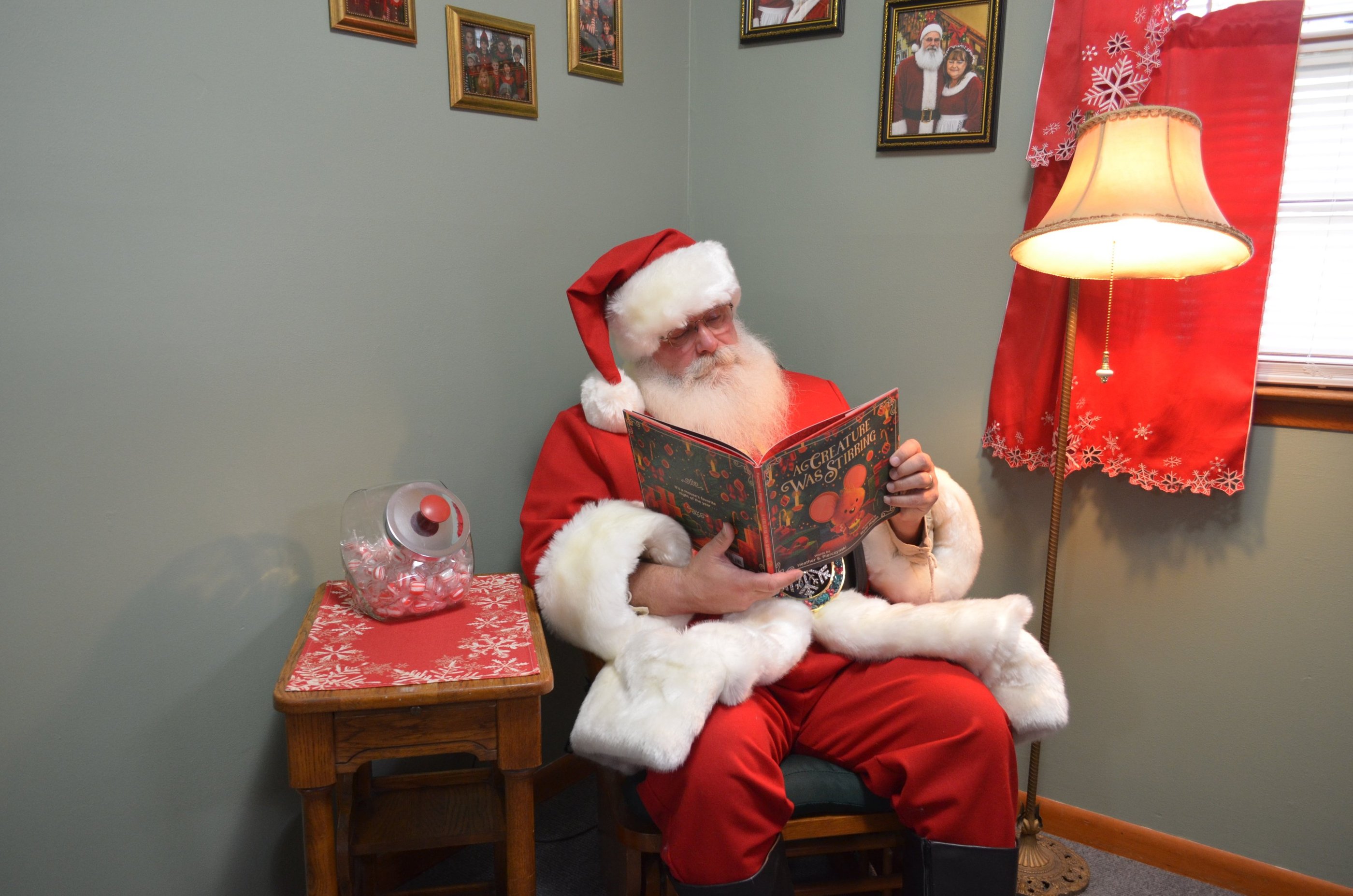 Santa Tom reading a storybook 