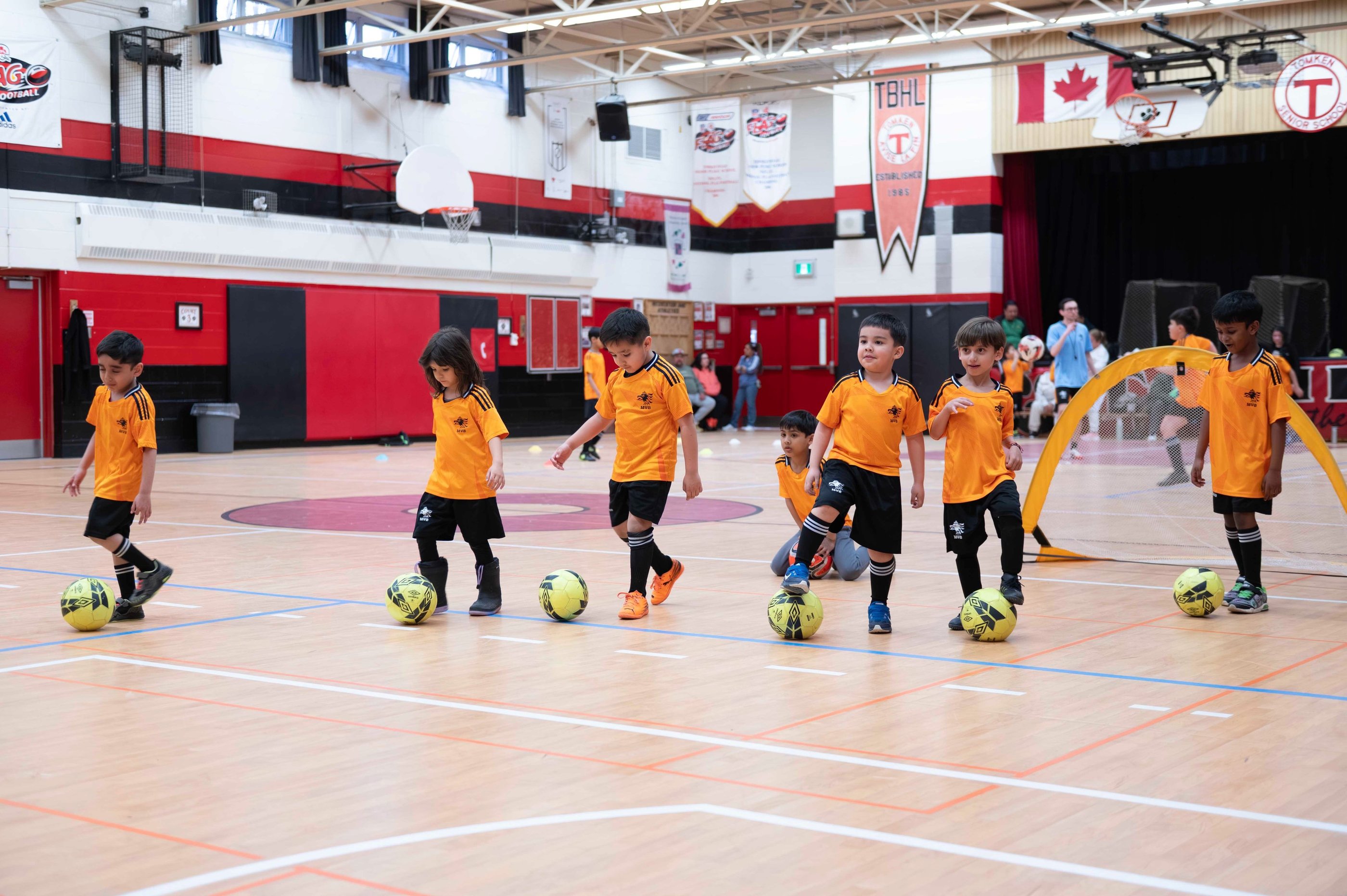Beginner soccer training for kids in Mississauga practicing ball control with MVB F.C.