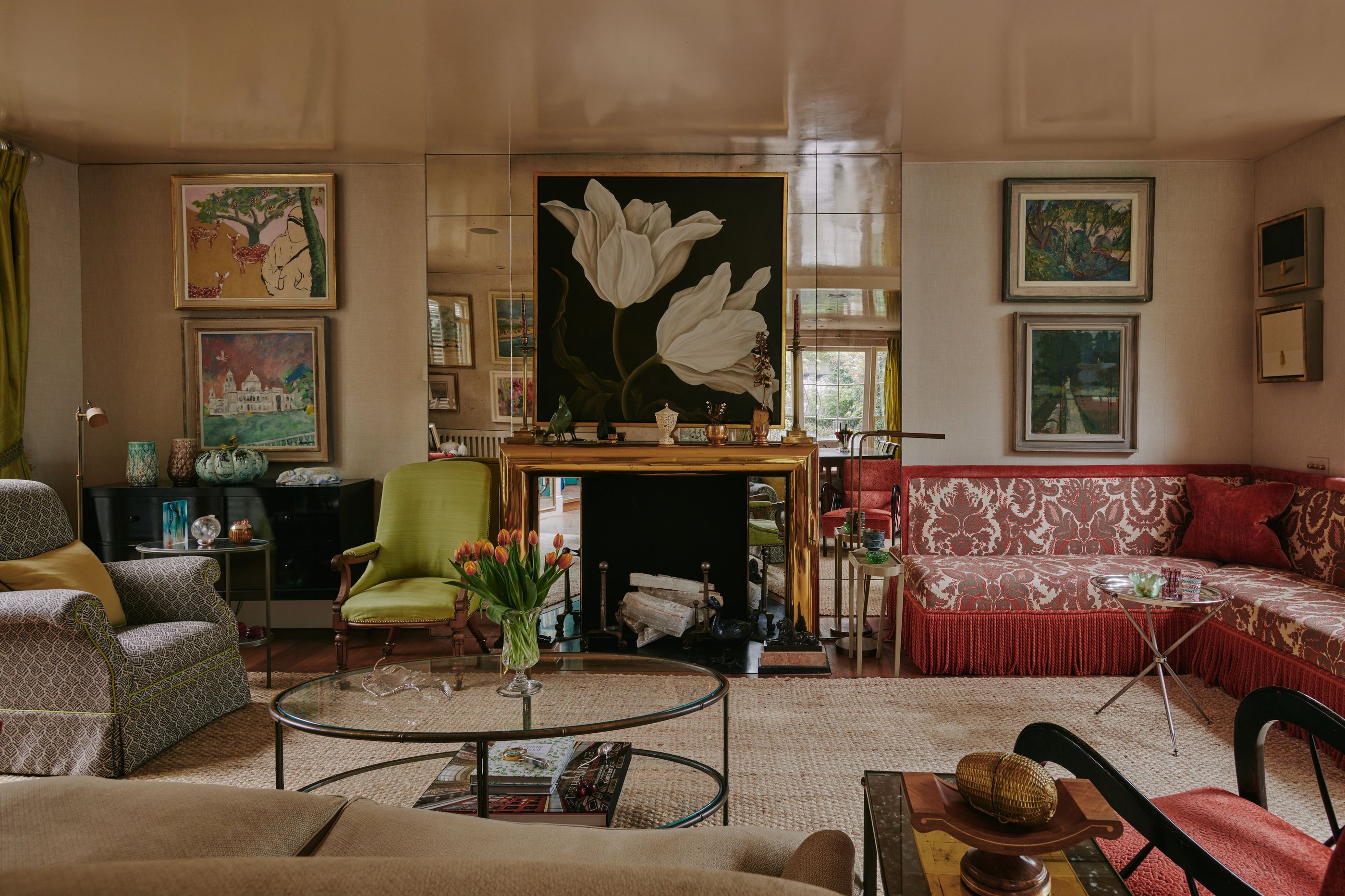 a living room with a couch and a table Nour Nagy Designs London interior Design