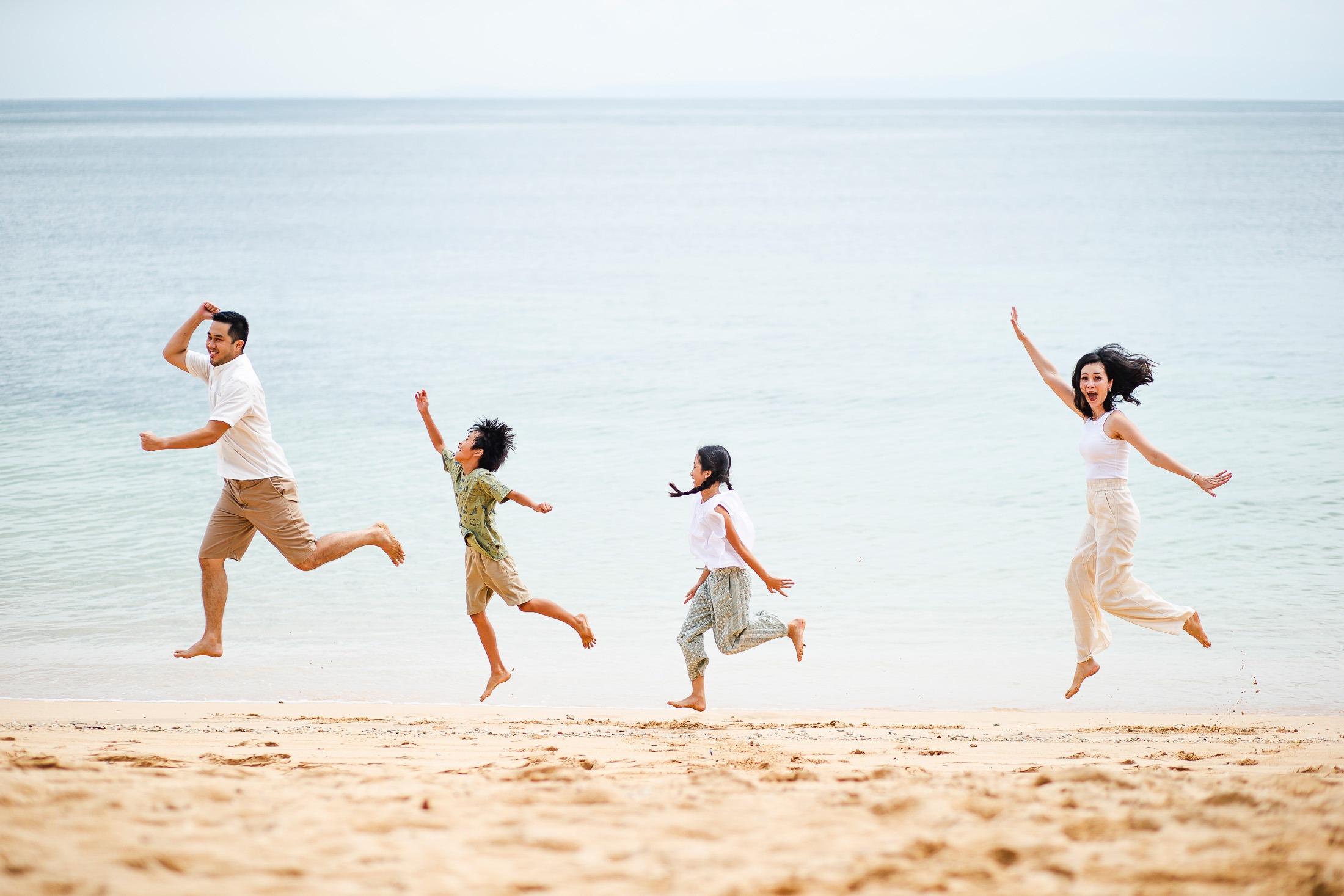 children playing during family photography session at Westin Nusa Dua beach Bali