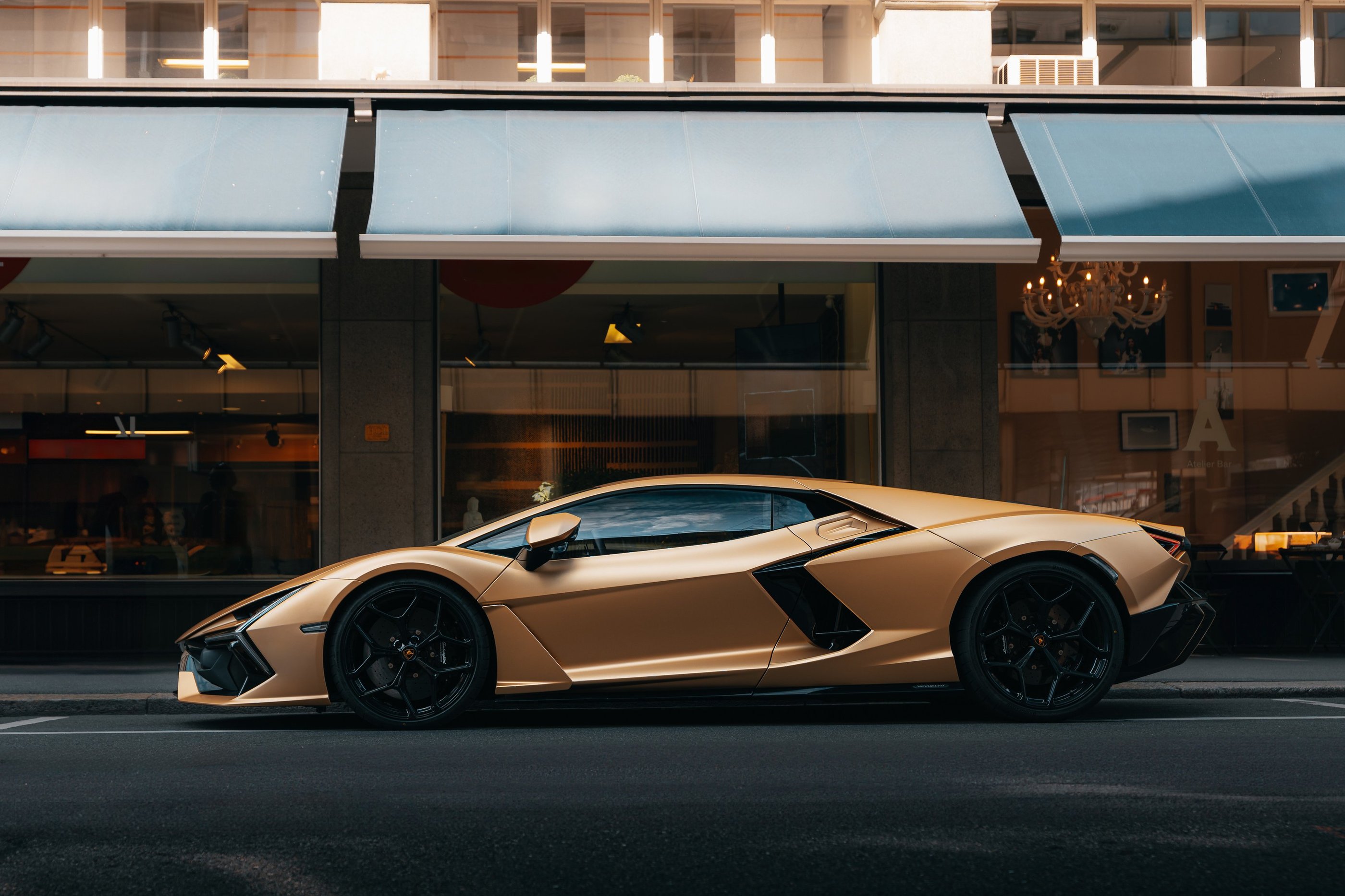 a gold colored lamborghini revuelto