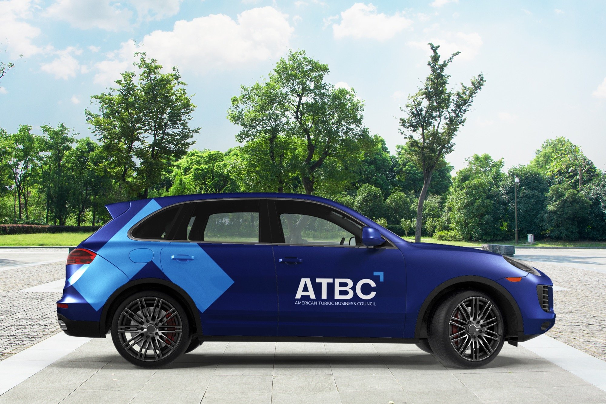 a blue car with a blue arrow on the side of it