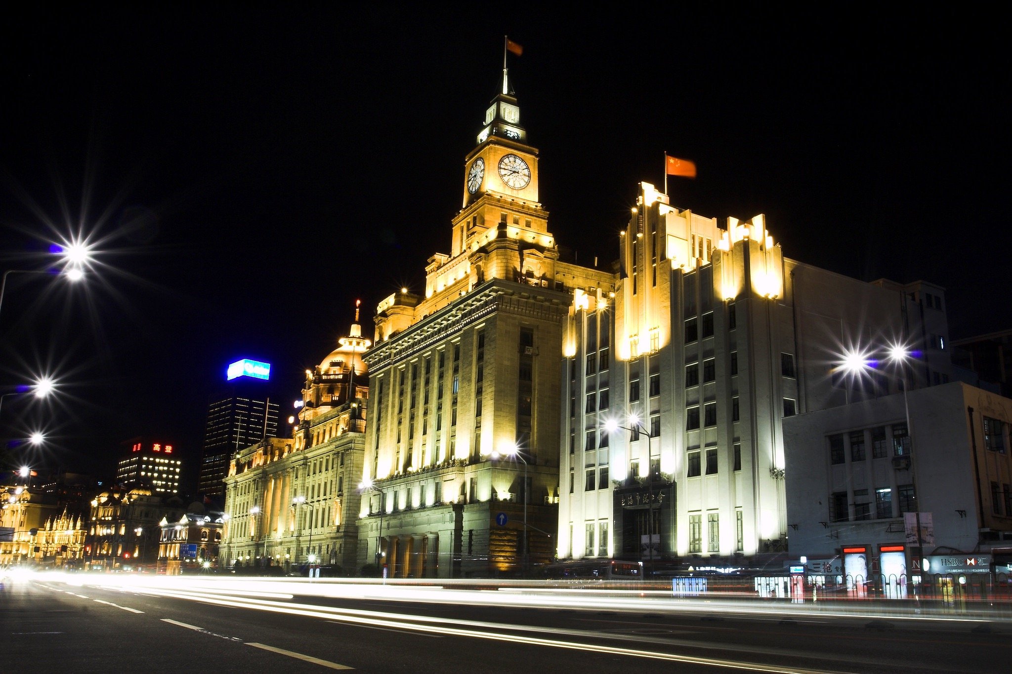 Cityscape of Shanghai Bund by Night with headlight trails