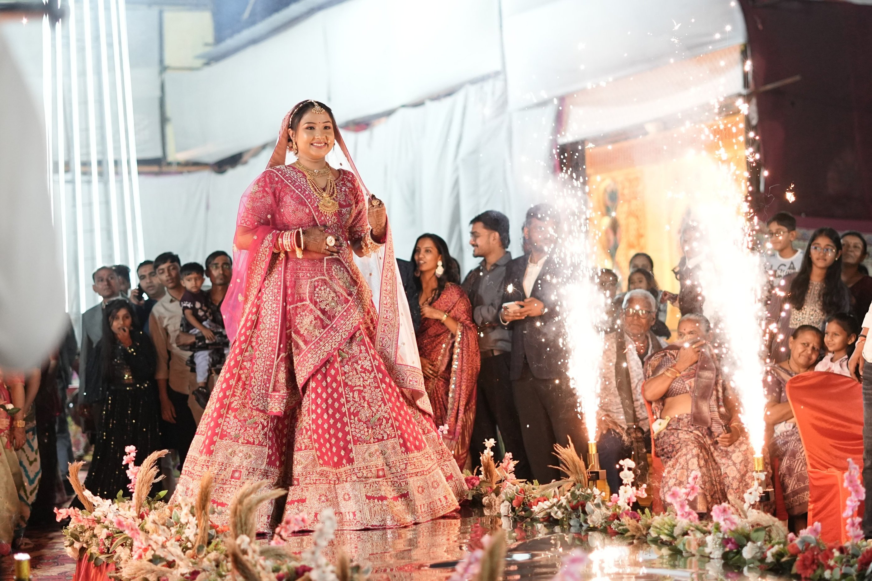 Professional traditional Indian bridal makeup featuring HD airbrush foundation with flawless coverag