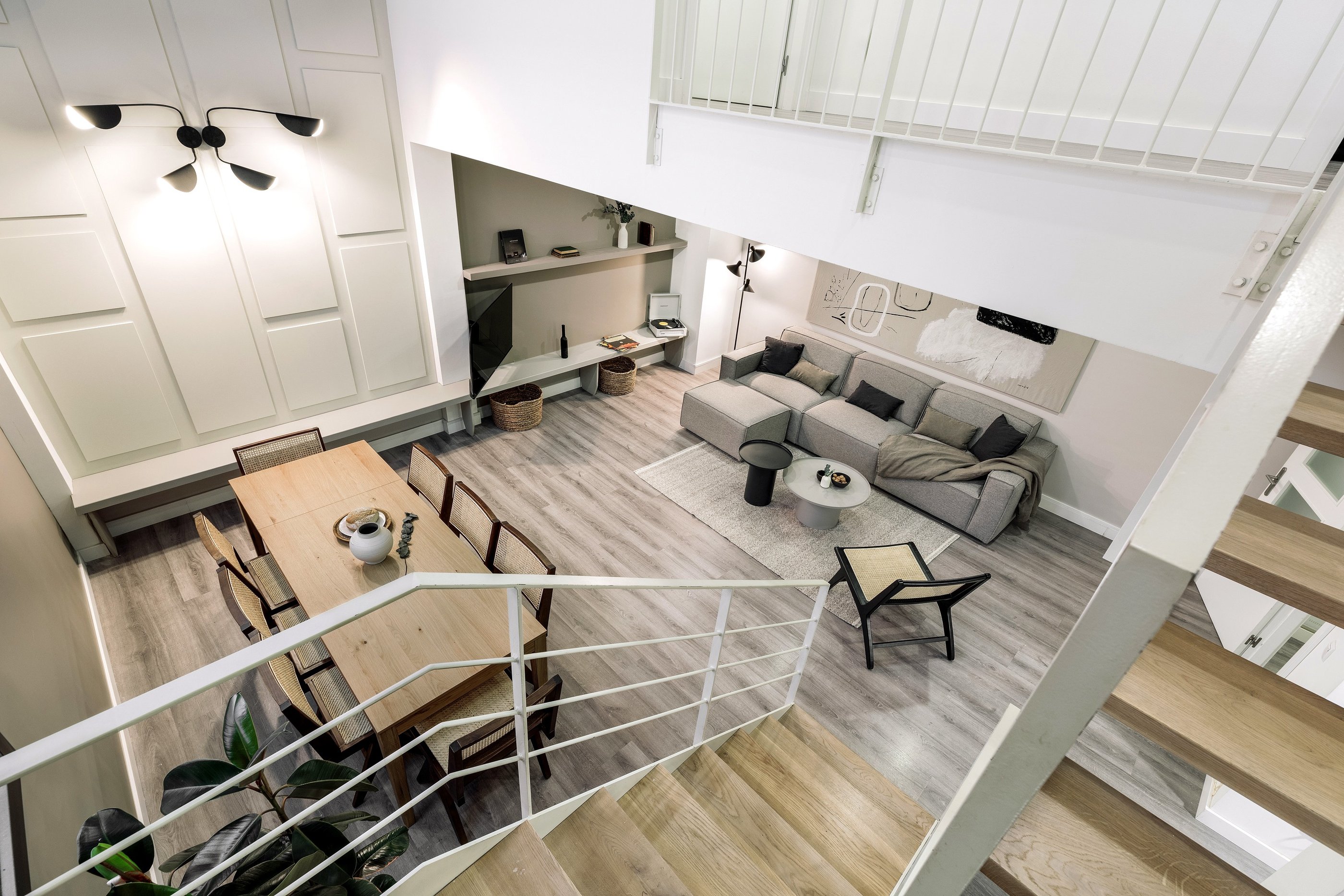 Contemporary loft apartment with a minimalist design, subtle lighting, neutral colors in Barcelona