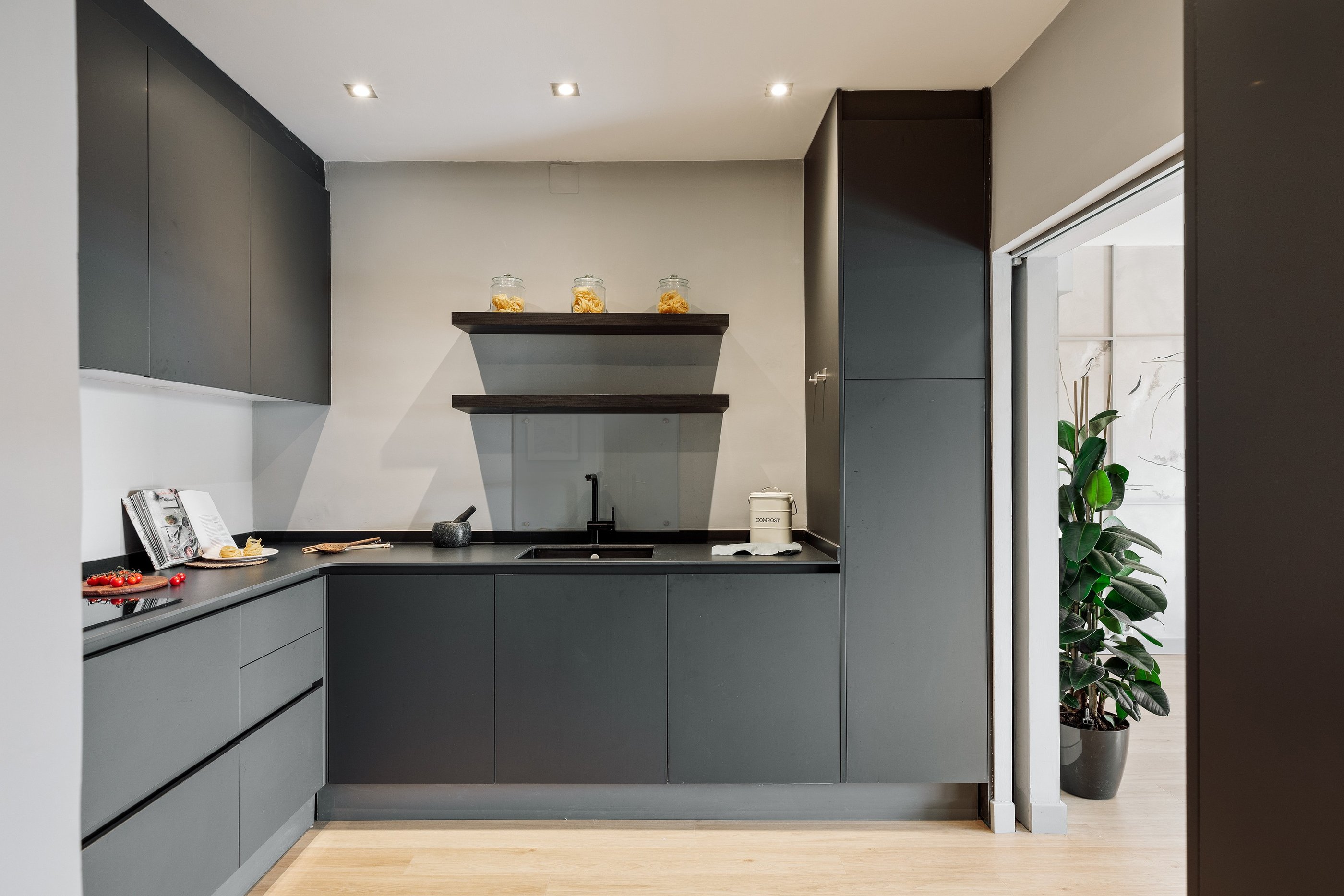 State of the art integrated dark grey kitchen design