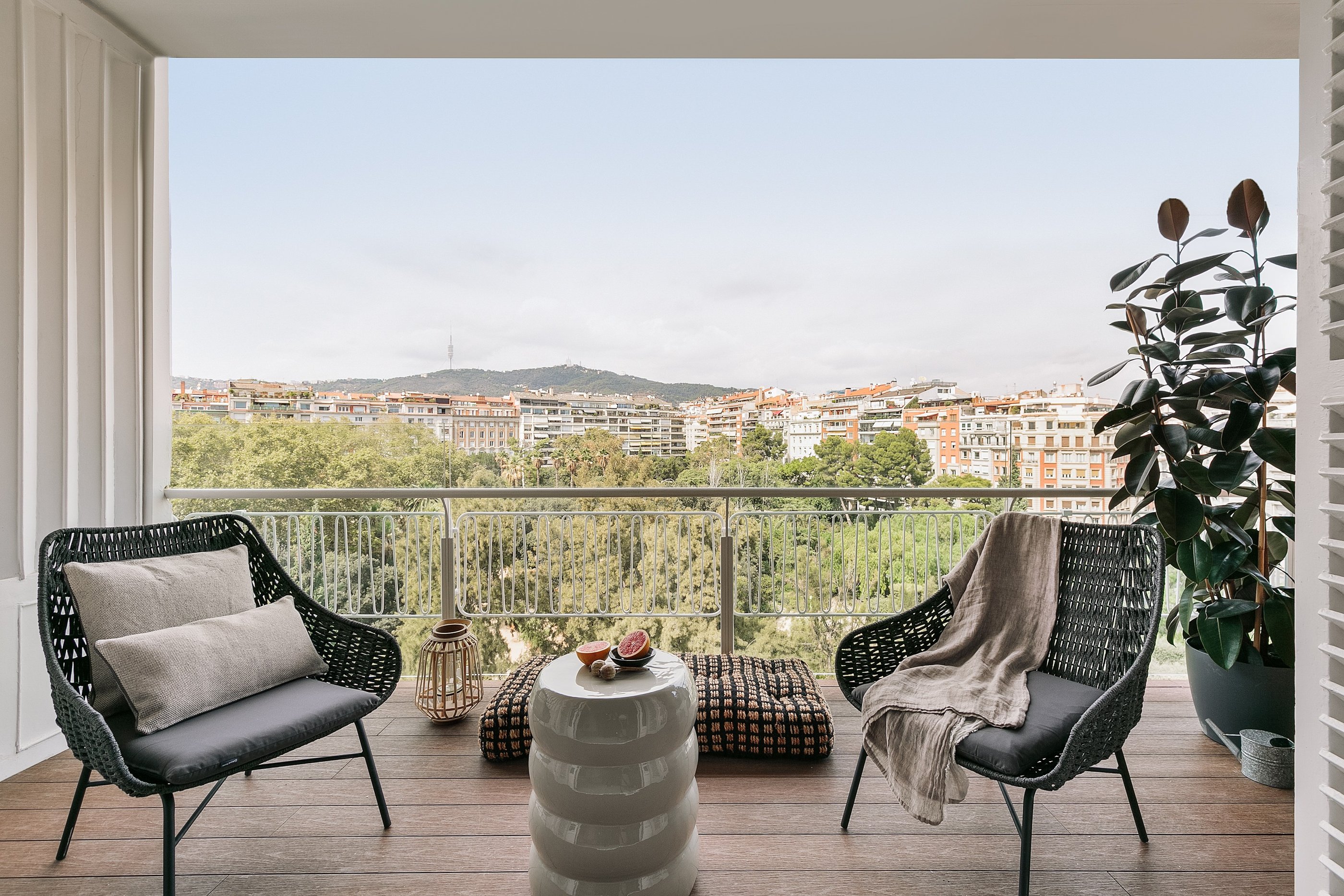 Private terrace with stunning views and outdoor seating, designed for RAMA in Barcelona Turo Park