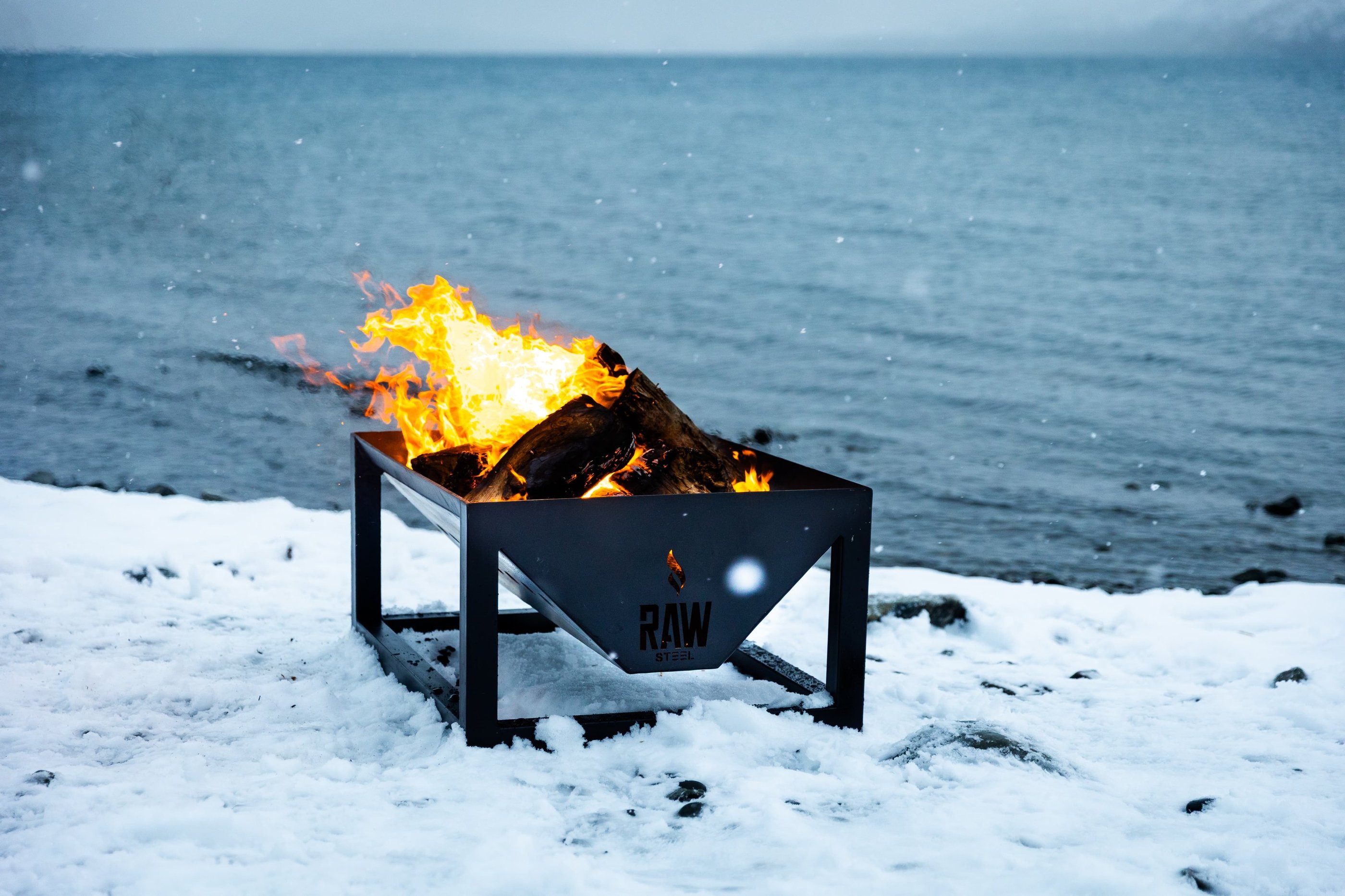 Rawsteelco firepit being used in the snow