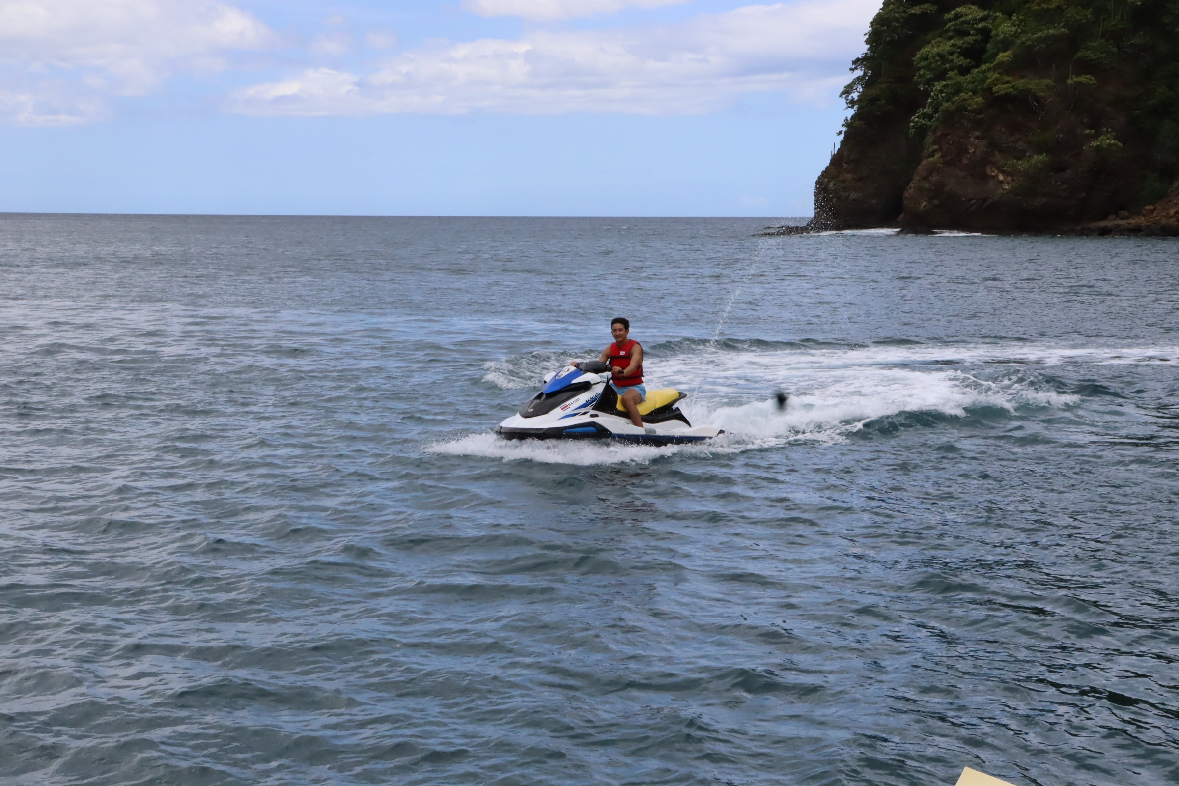 Riding jet ski during private tour in Papagayo Gulf, Costa Rica