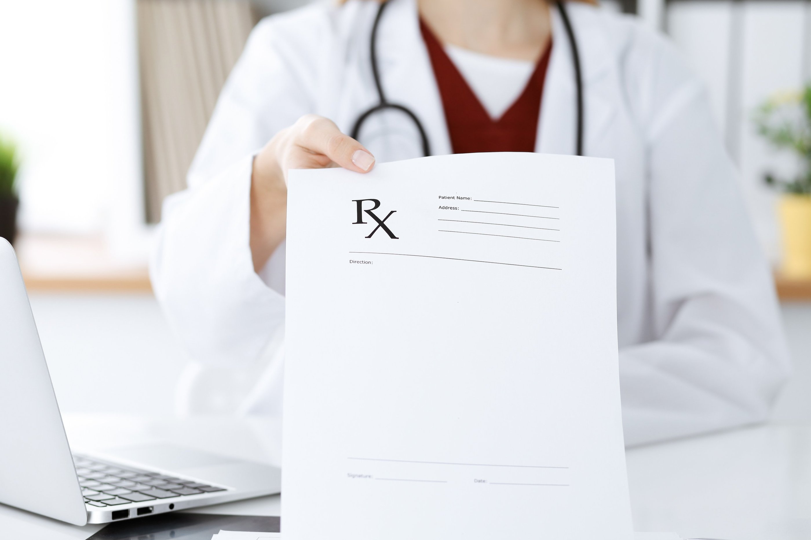 Doctor referring a patient to All Services Home Health for in-home care