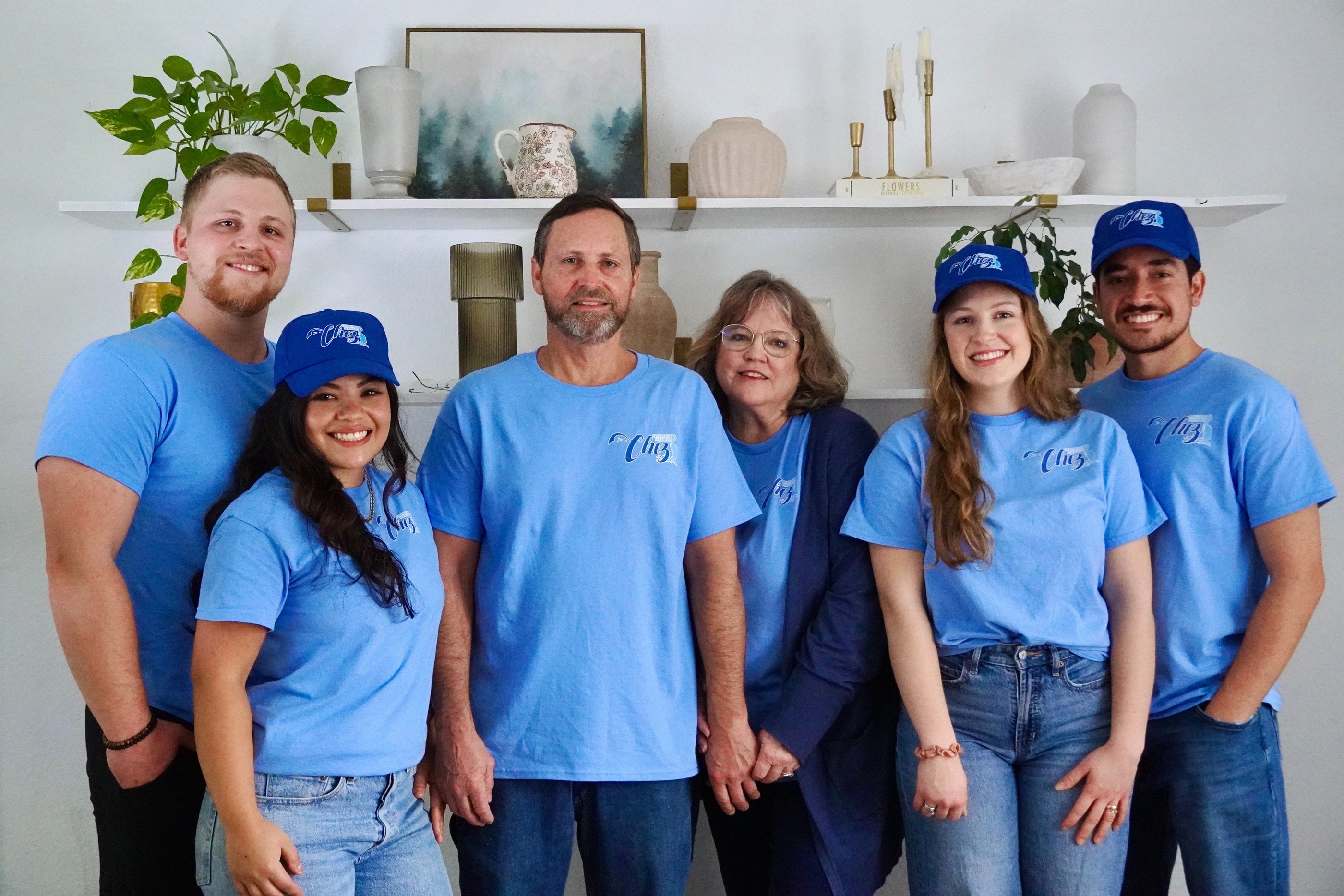 Three couples of cleaners from Chez Cleaning Services smilling for a team picture