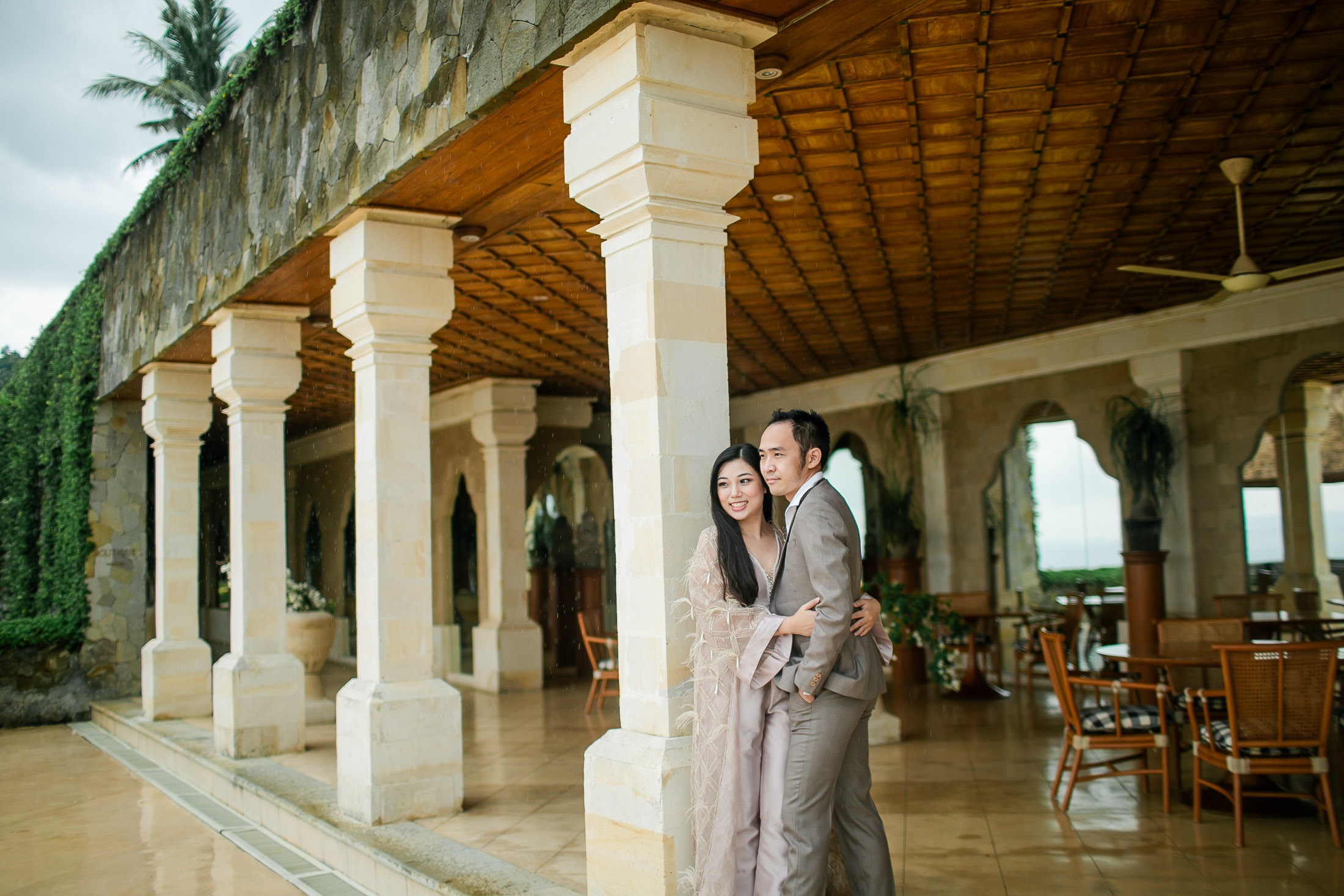 Luxury prewedding portrait at pavilion corridor of Amankila Karangasem Bali