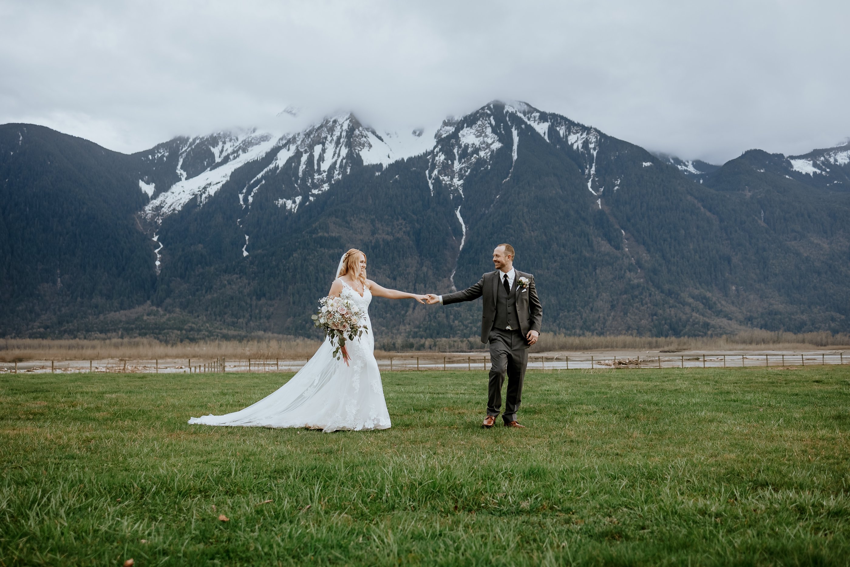 agassiz wedding photography fraser river lodge Holding Hands with mountains