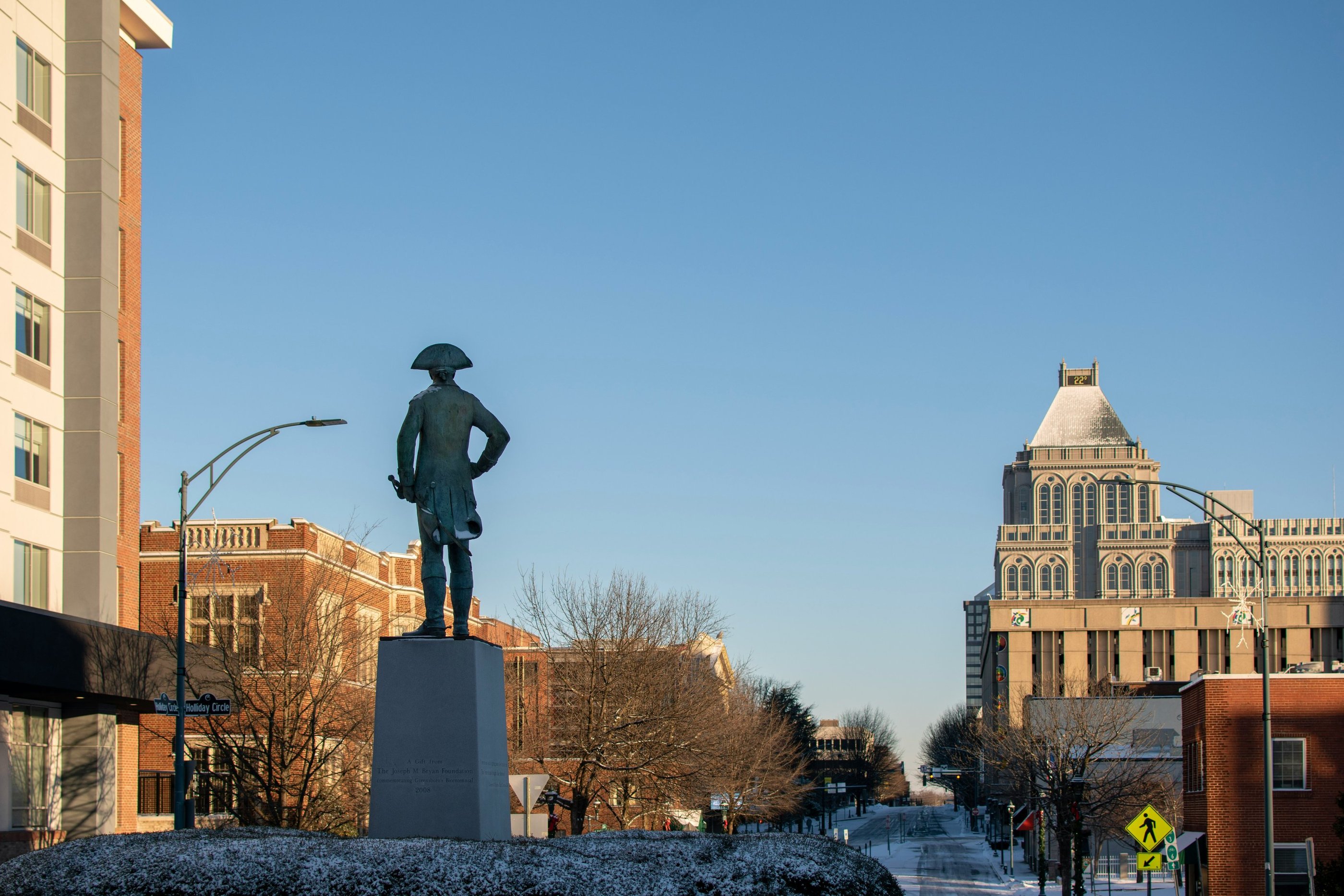 Shot of Downtown Greensboro and a statue of General Green