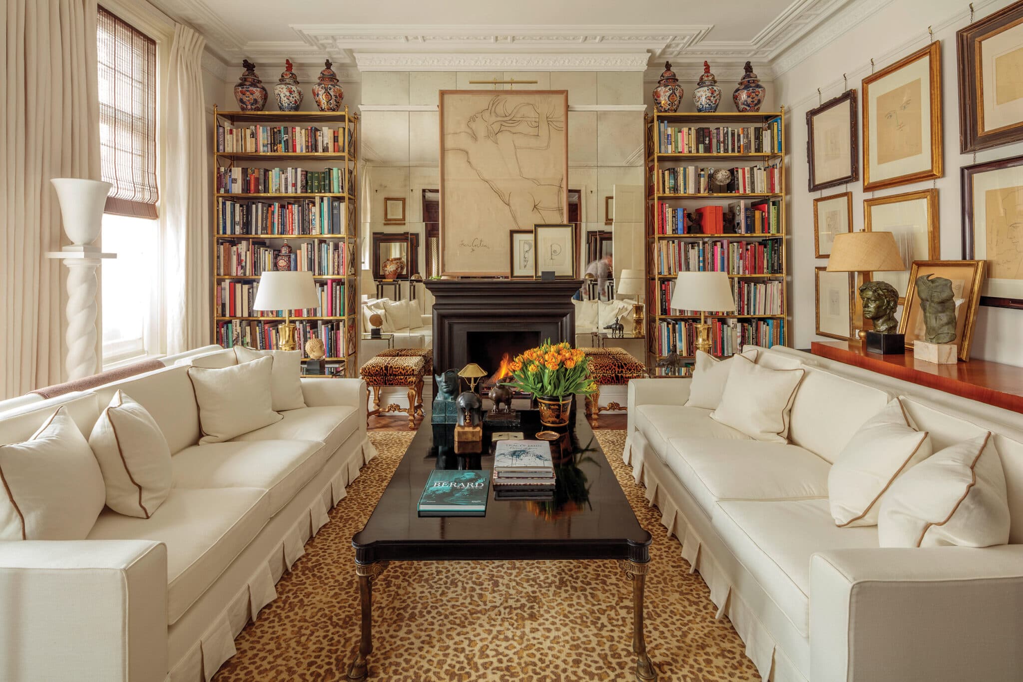 a living room with a fireplace and a fireplace Nour Nagy Designs London interior Design