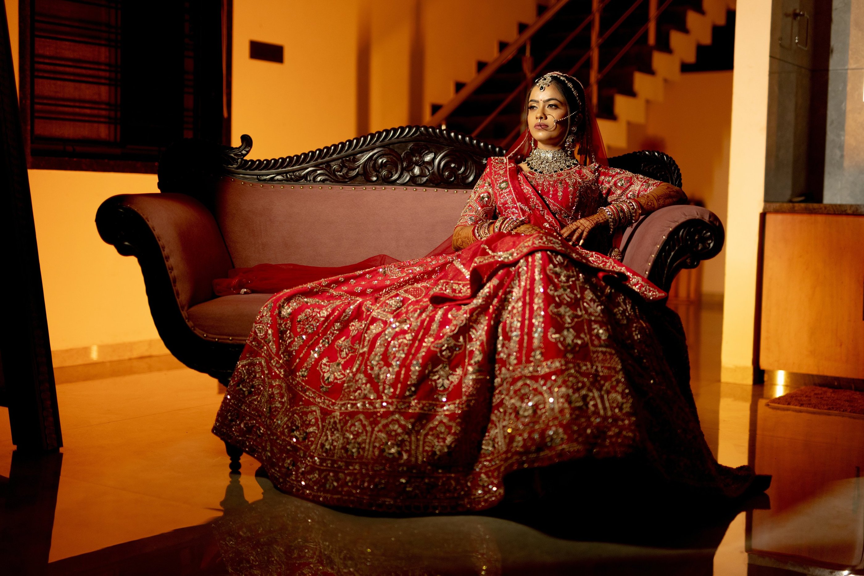 rd-bridal-makeup-vadodara-red-lehenga-bride-solo-portrait-indoor-gujarati-bride